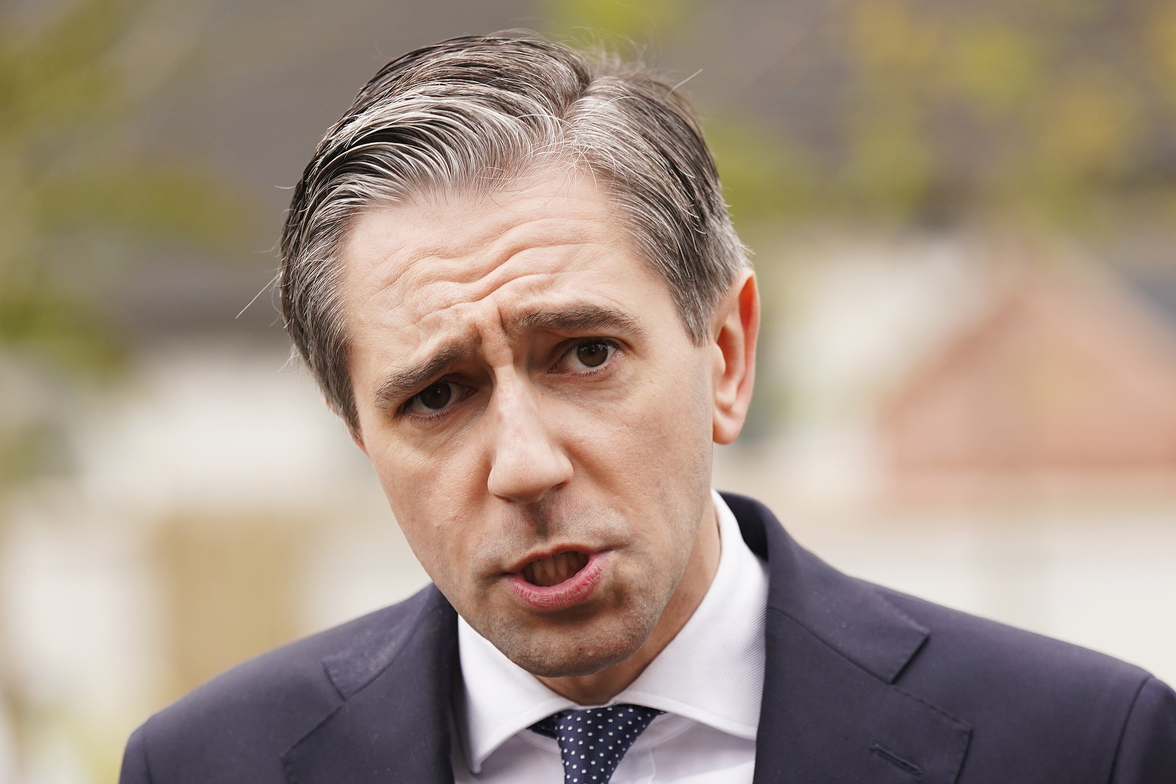 Simon Harris said the impact on civilians was ‘profoundly worrying’ (Brian Lawless/PA)