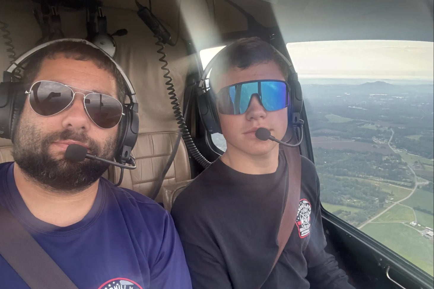 Jordan Seidhom (left) was threatened with arrest after conducting multiple volunteer rescue missions in his helicopter with his son in North Carolina