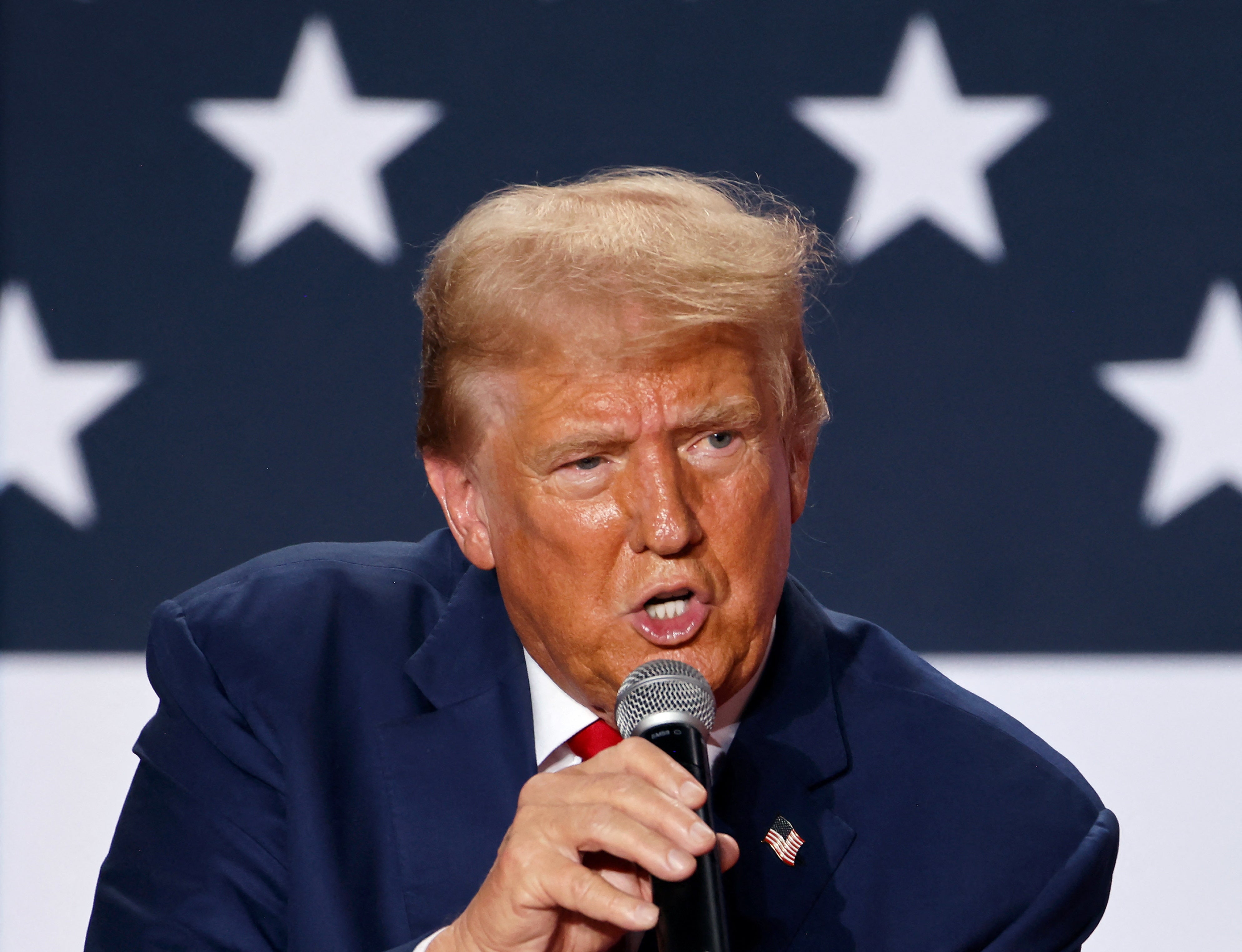 Republican presidential nominee and former U.S. President Donald Trump speaks at a town hall as he campaigns in Fayetteville, North Carolina