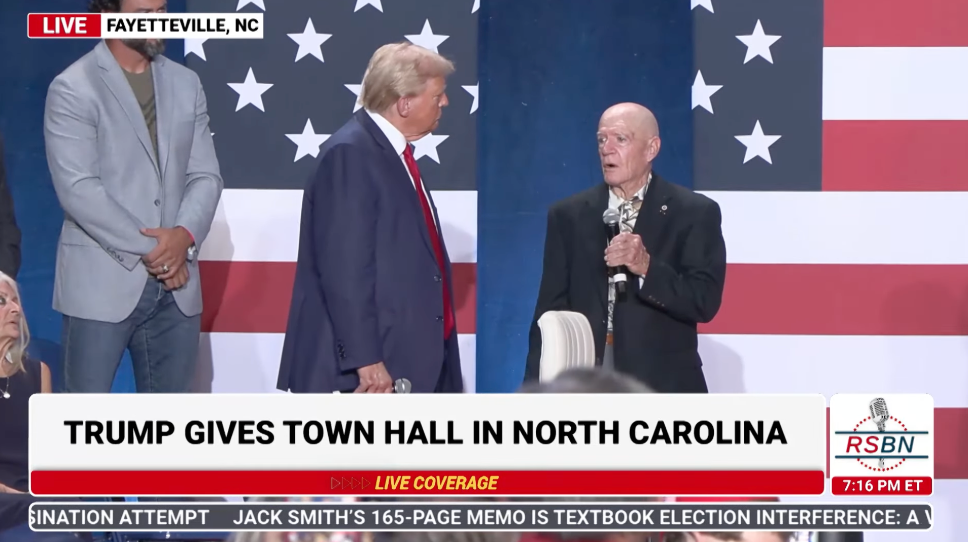 Donald Trump accepts a Vietnam veteran’s Purple Heart medal at a rally