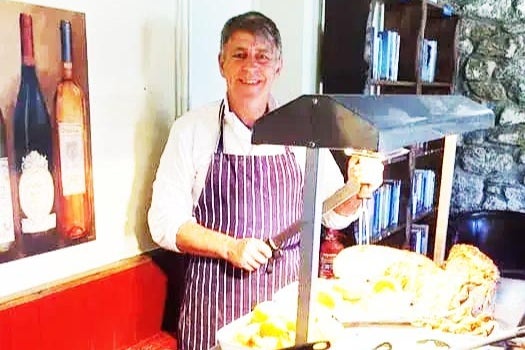 Mark Graham runs the roost at his all-you-can-eat Sunday roast buffet