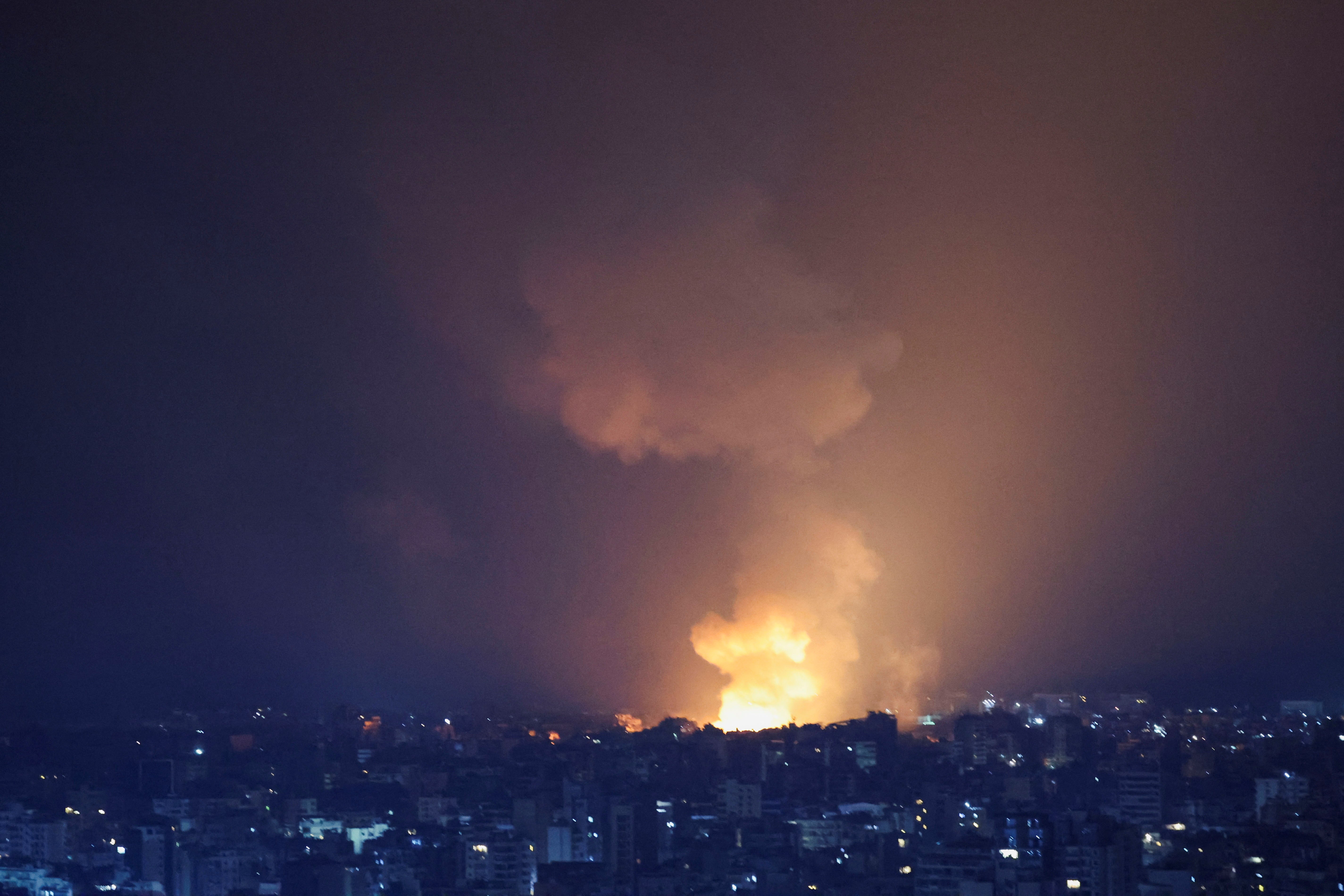 Smoke and flames rise over Beirut’s southern suburbs after Israeli strike early Sunday