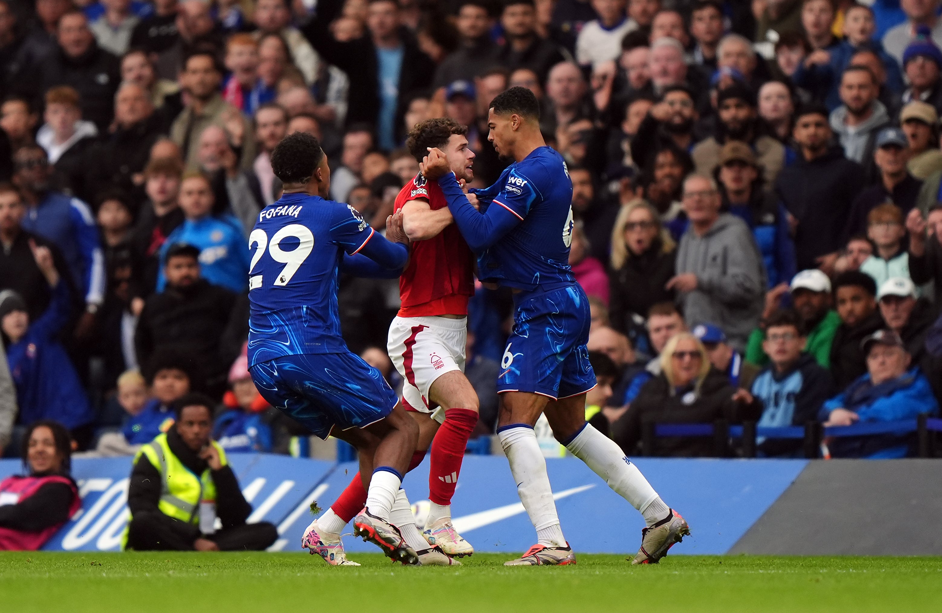 Nottingham Forest’s Neco Williams and Chelsea’s Levi Colwill clash