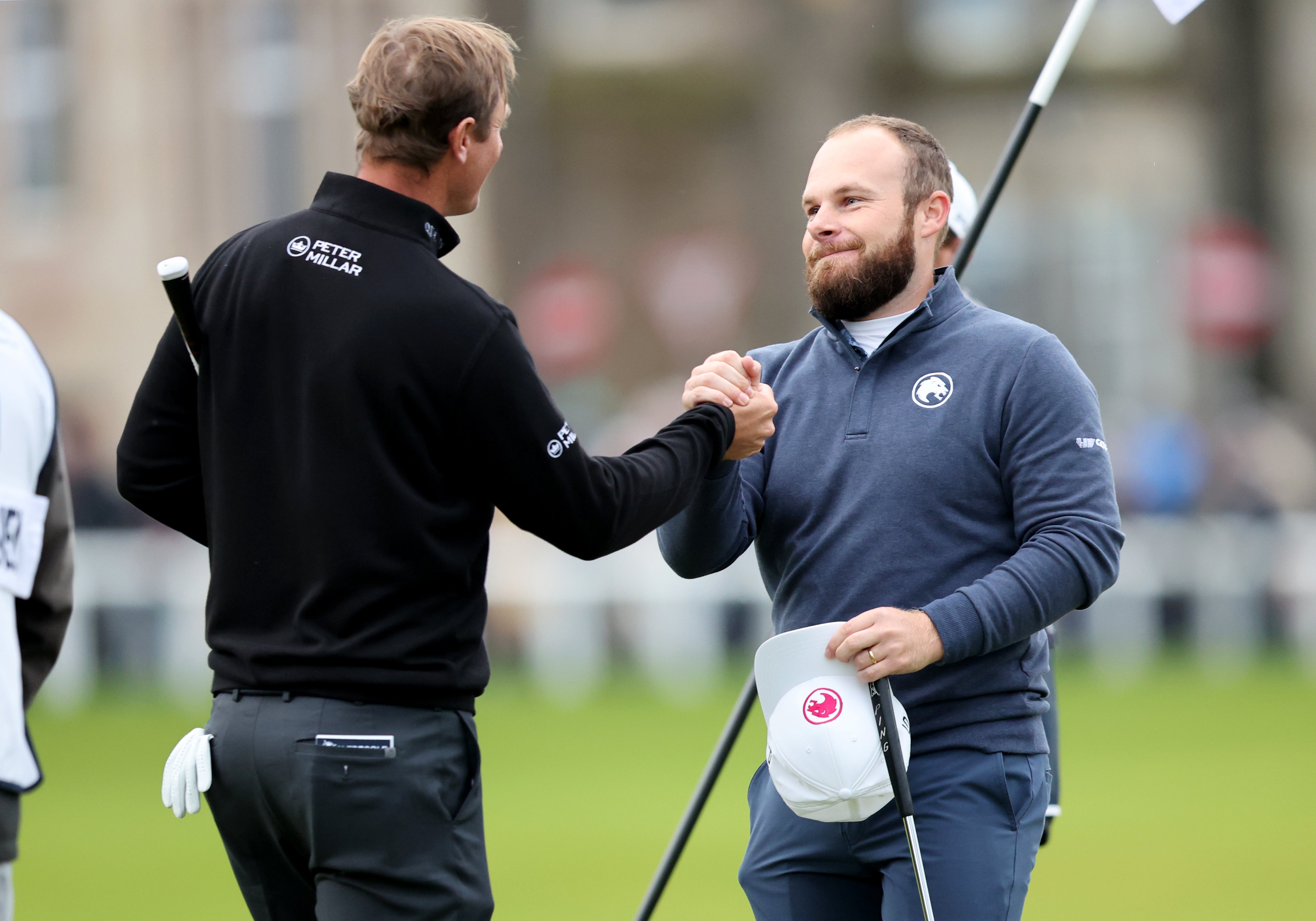 Hatton (right) shook hands with Colsaerts after his winning putt on the 18th green