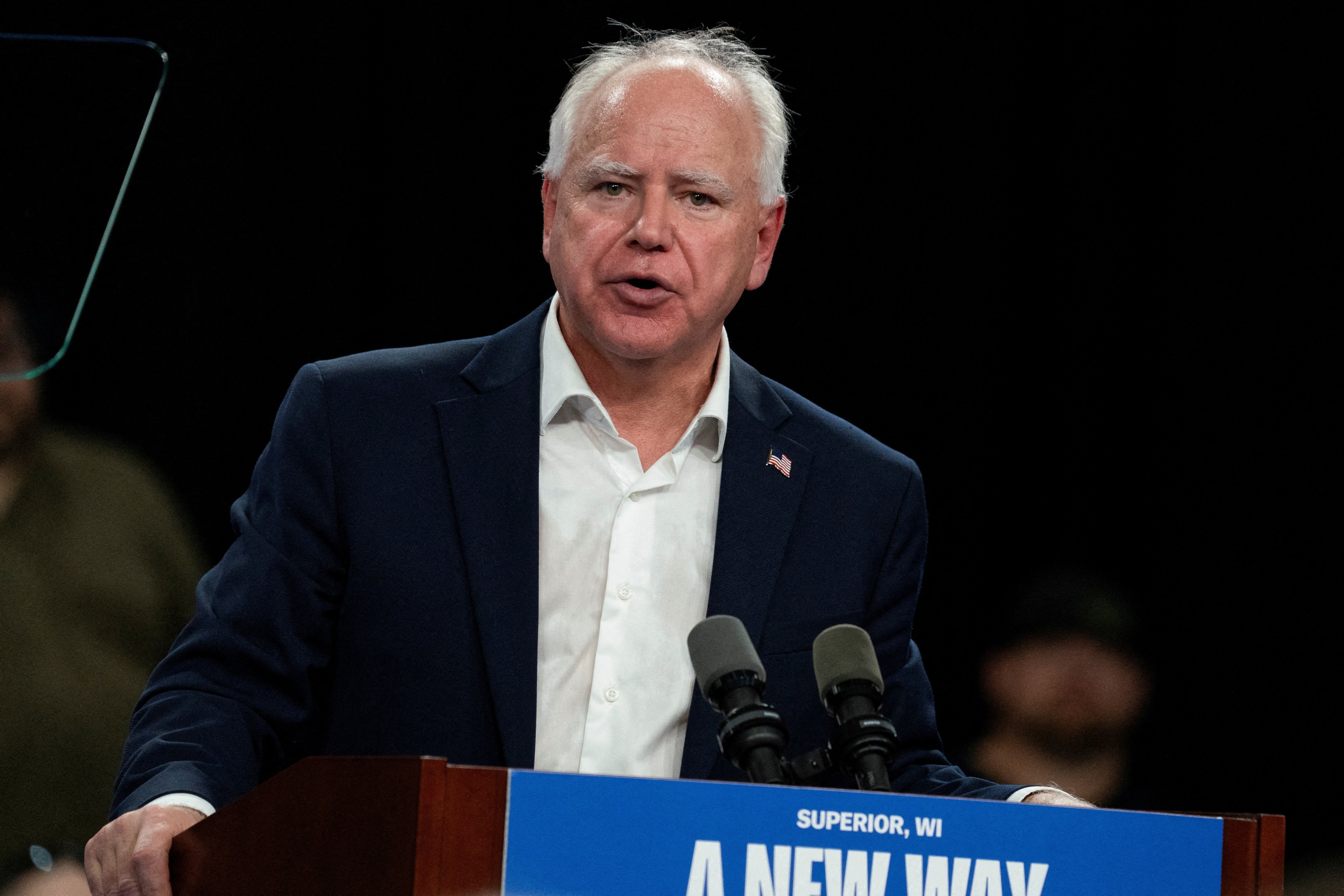 Tim Walz delivers remarks at a campaign event in Wisconsin on September 14.