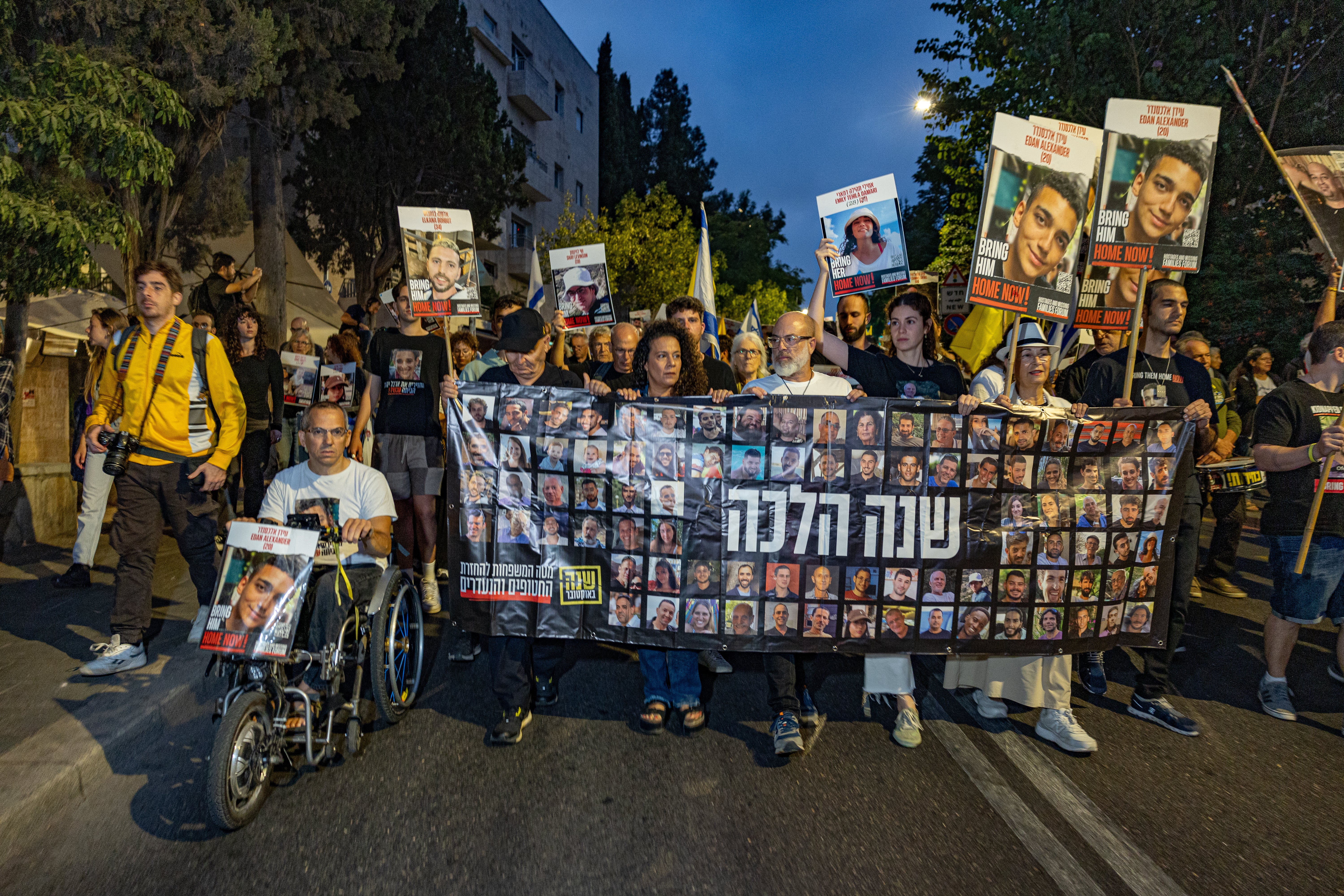 The families of Israeli hostages held in Gaza, some of whom have been killed, march in Jerusalem this morning to mark exact moment Hamas invaded Israel last October