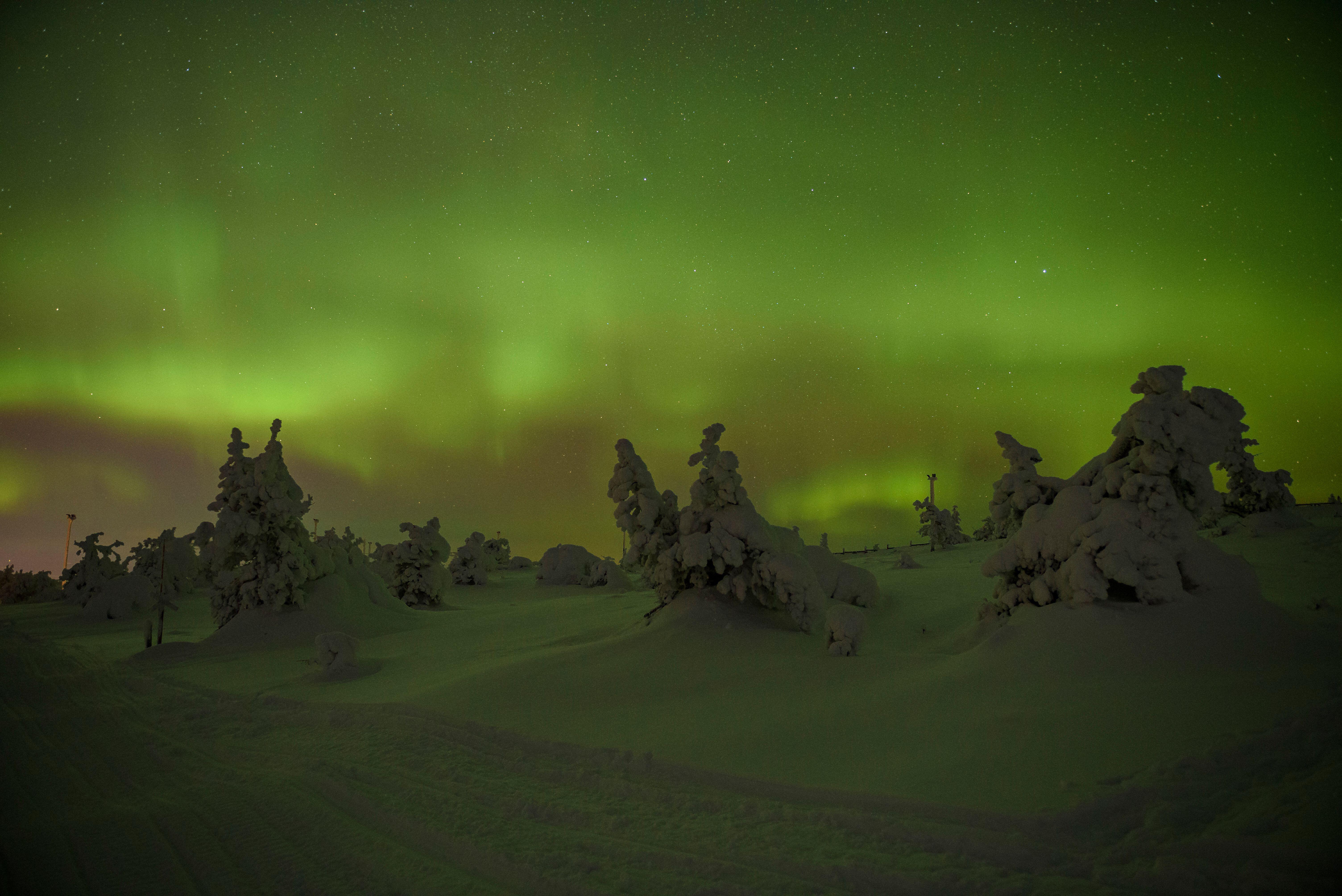 Northern lights over Levi Mountain and ski resort (Alamy/PA)