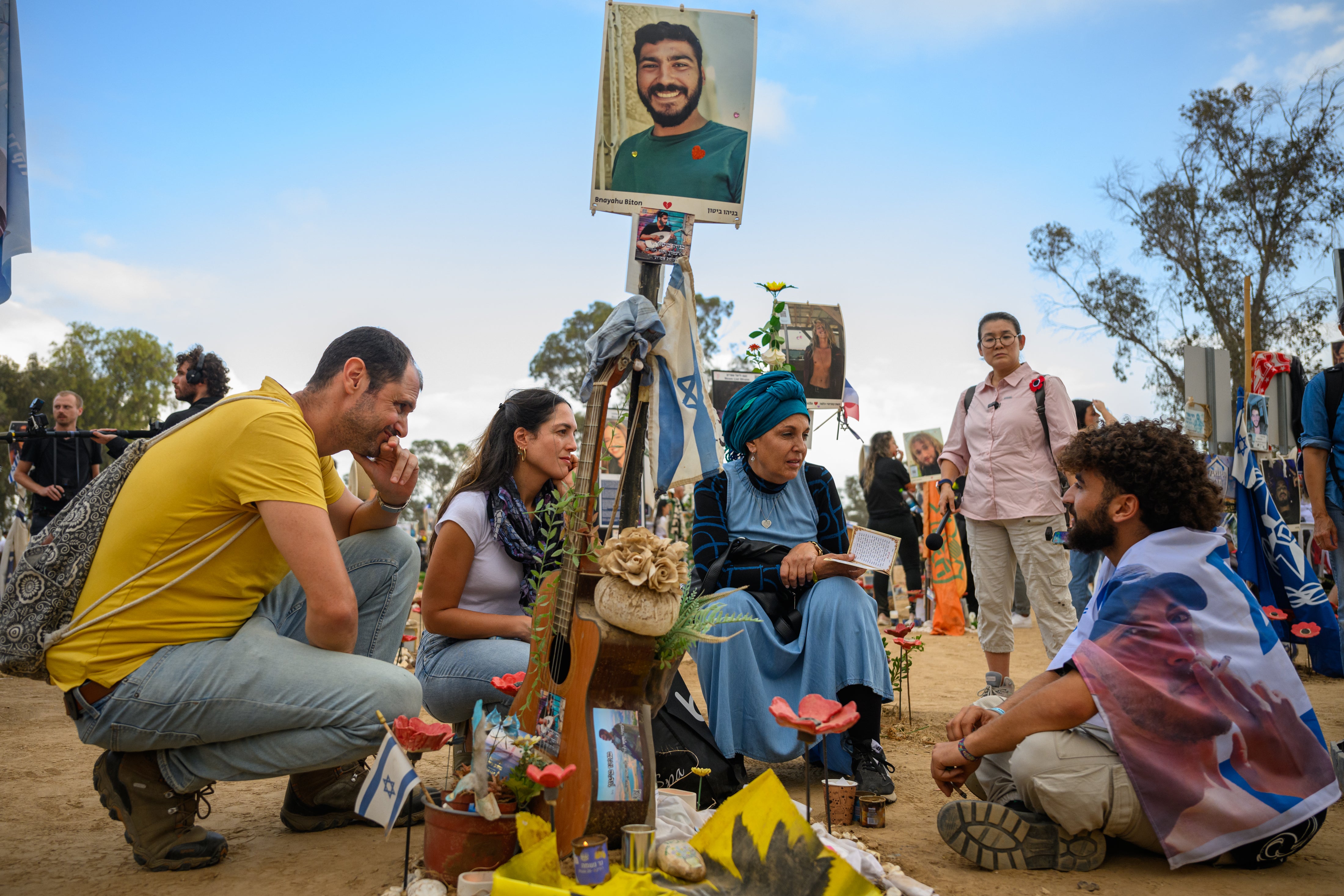 Family and friends gather at the Nova festival memorial to mark the first anniversary since Hamas attacked one year ago on 7 October 2024 in Re'im, Israel