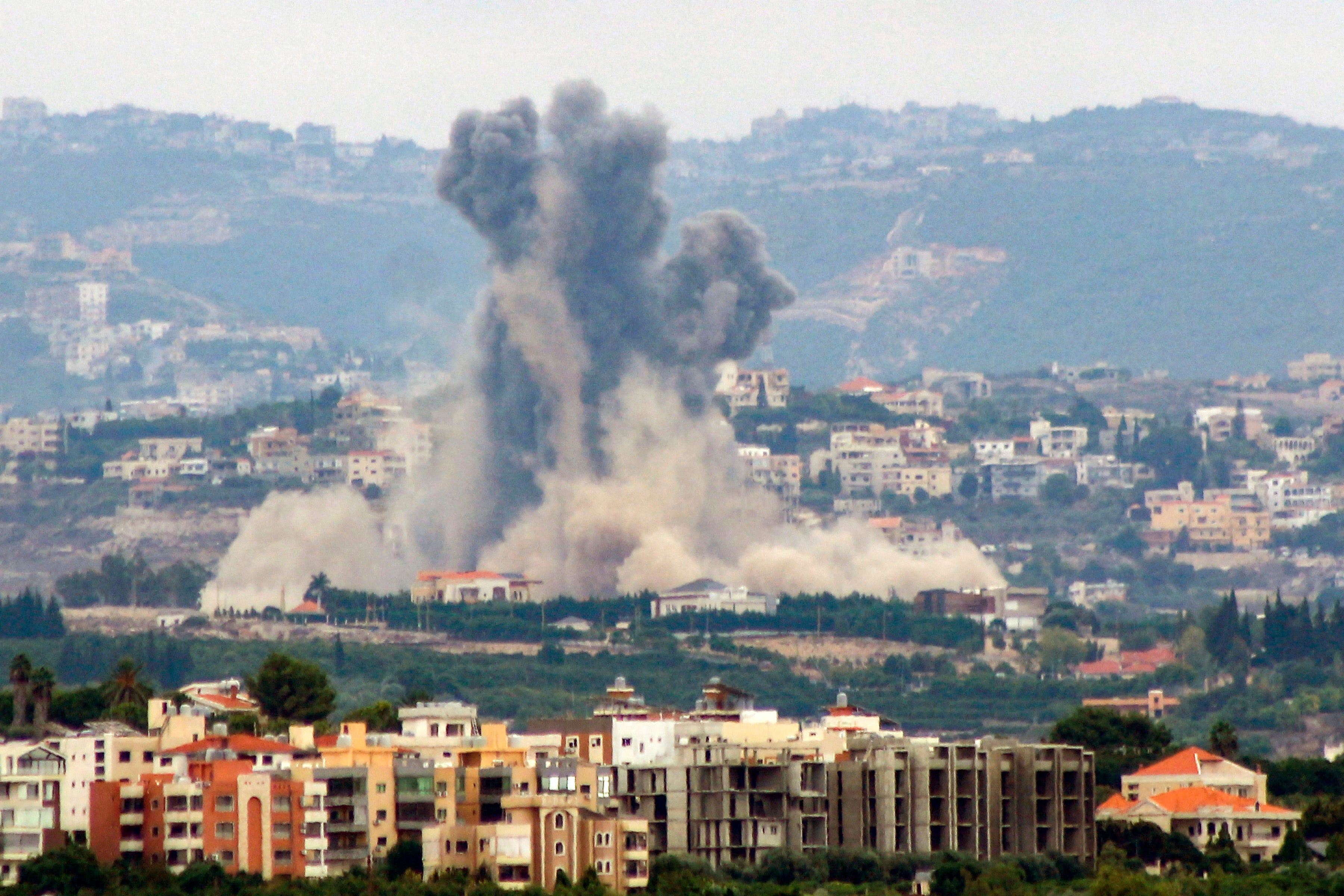 Smoke billowing from the site of an Israeli airstrike that targeted the southern Lebanese village of Rmadiyeh