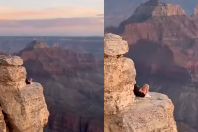 The tourists were captured on camera sitting high above the drop