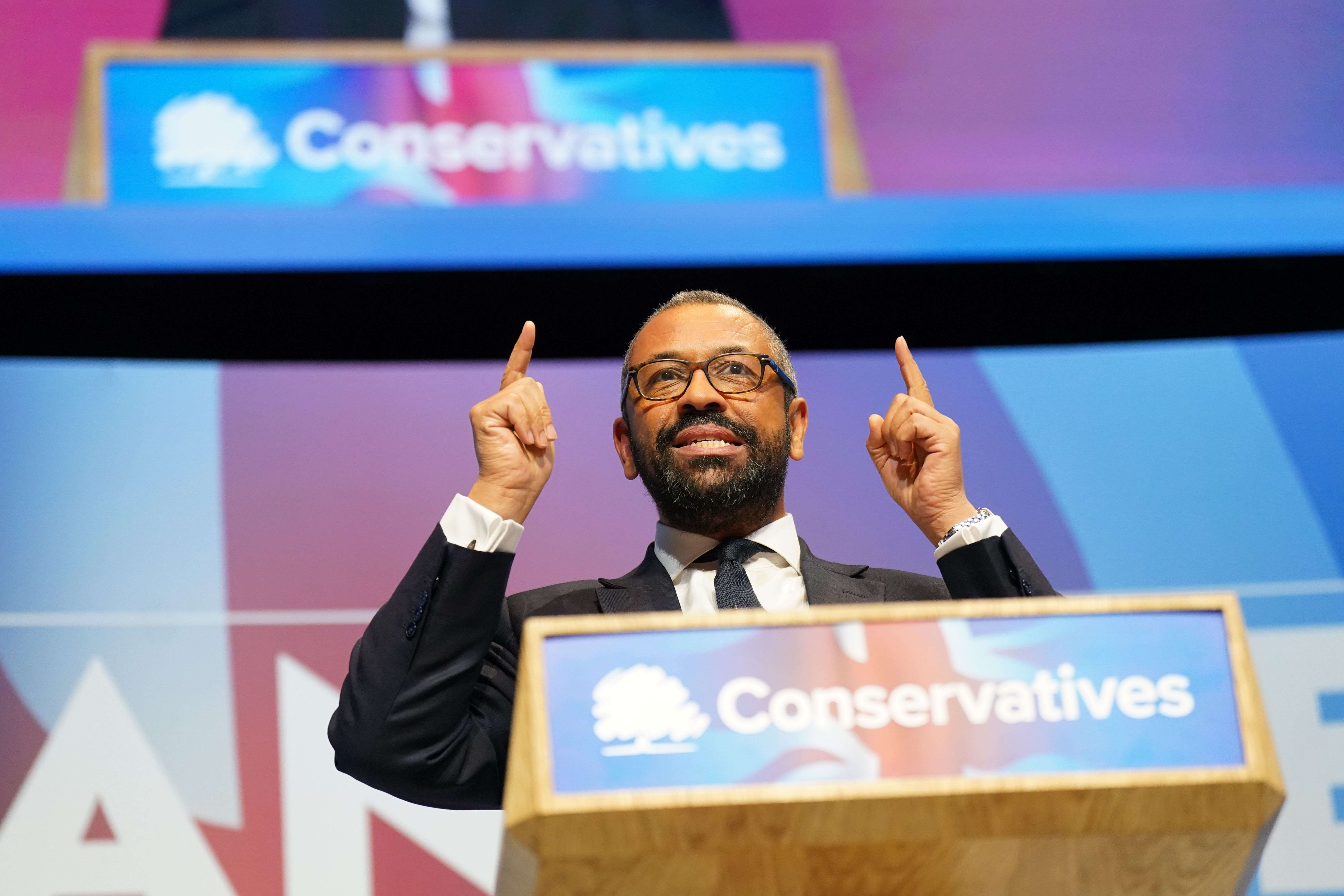 Conservative Party leadership candidate James Cleverly delivers a speech during the Conservative Party conference at the International Convention Centre in Birmingham (Stefan Rousseau/PA)