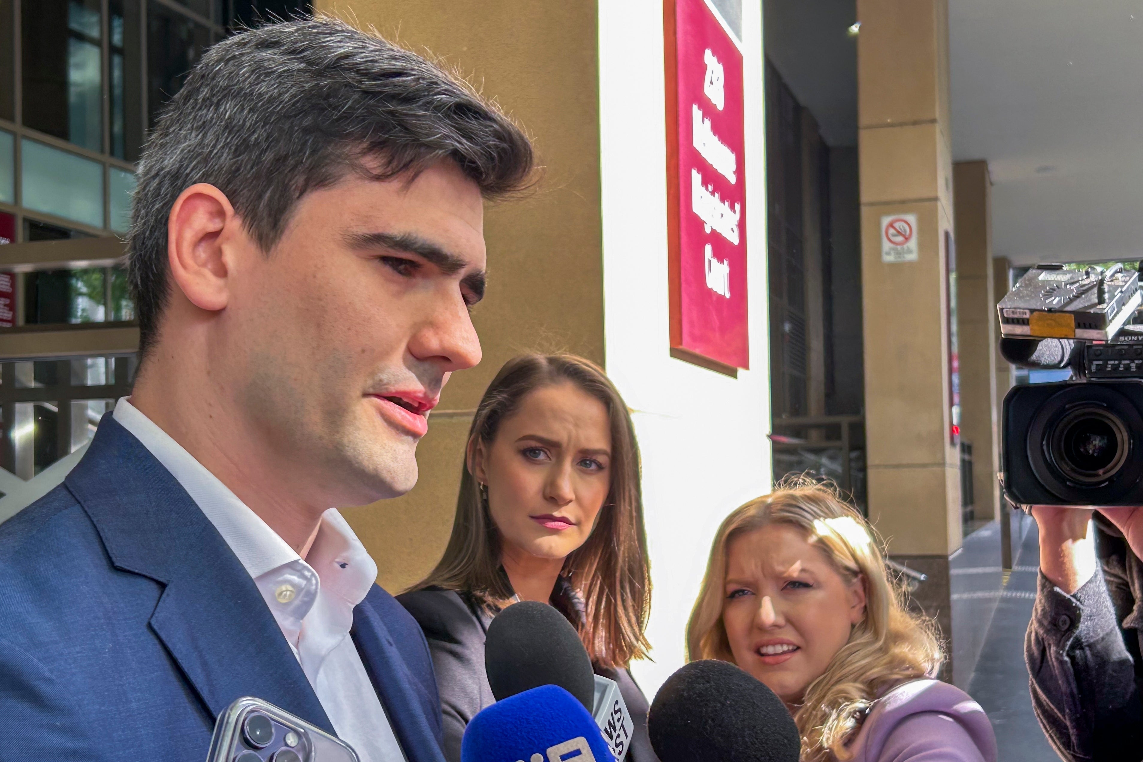 Jacob Hersant, a self-described Nazi, talks to the media outside the Melbourne Magistrates Court