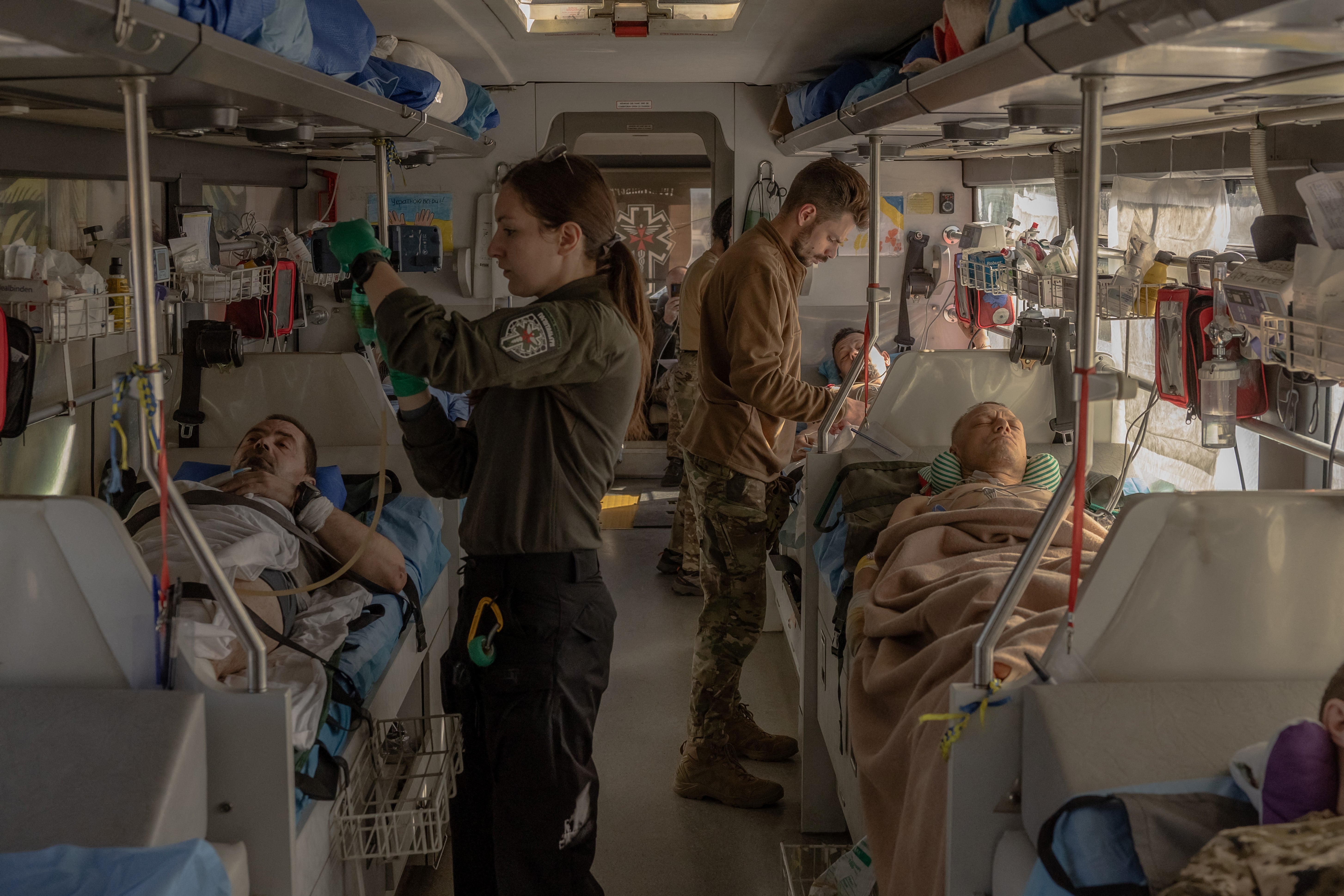 Paramedics of the volunteer medical battalion Hospitallers treat Ukrainian servicemen