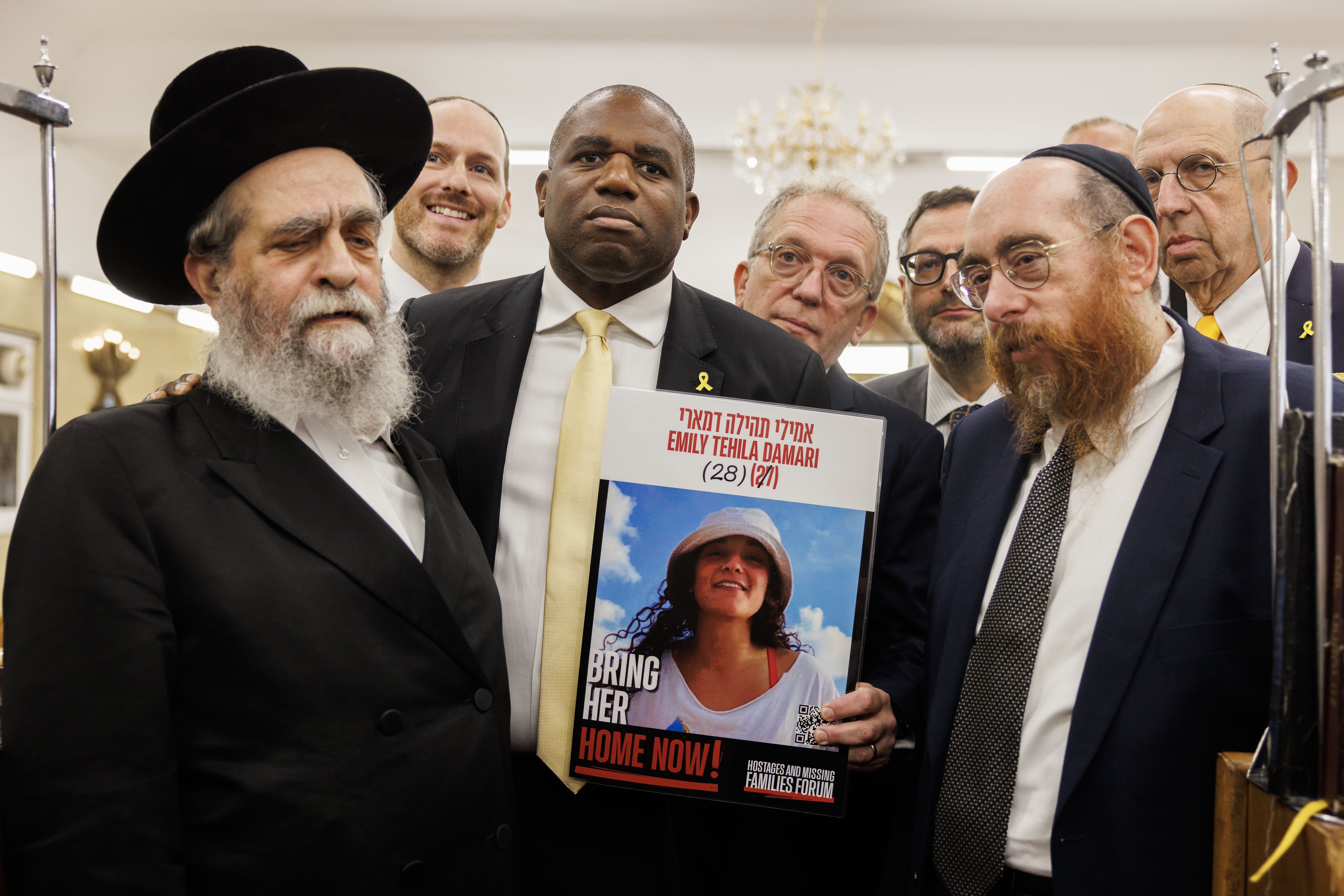 Foreign secretary David Lammy (centre left) with members of the Jewish community during a visit to South Tottenham Synagogue in London, to mark the year anniversary of the 7 October attacks on Israel