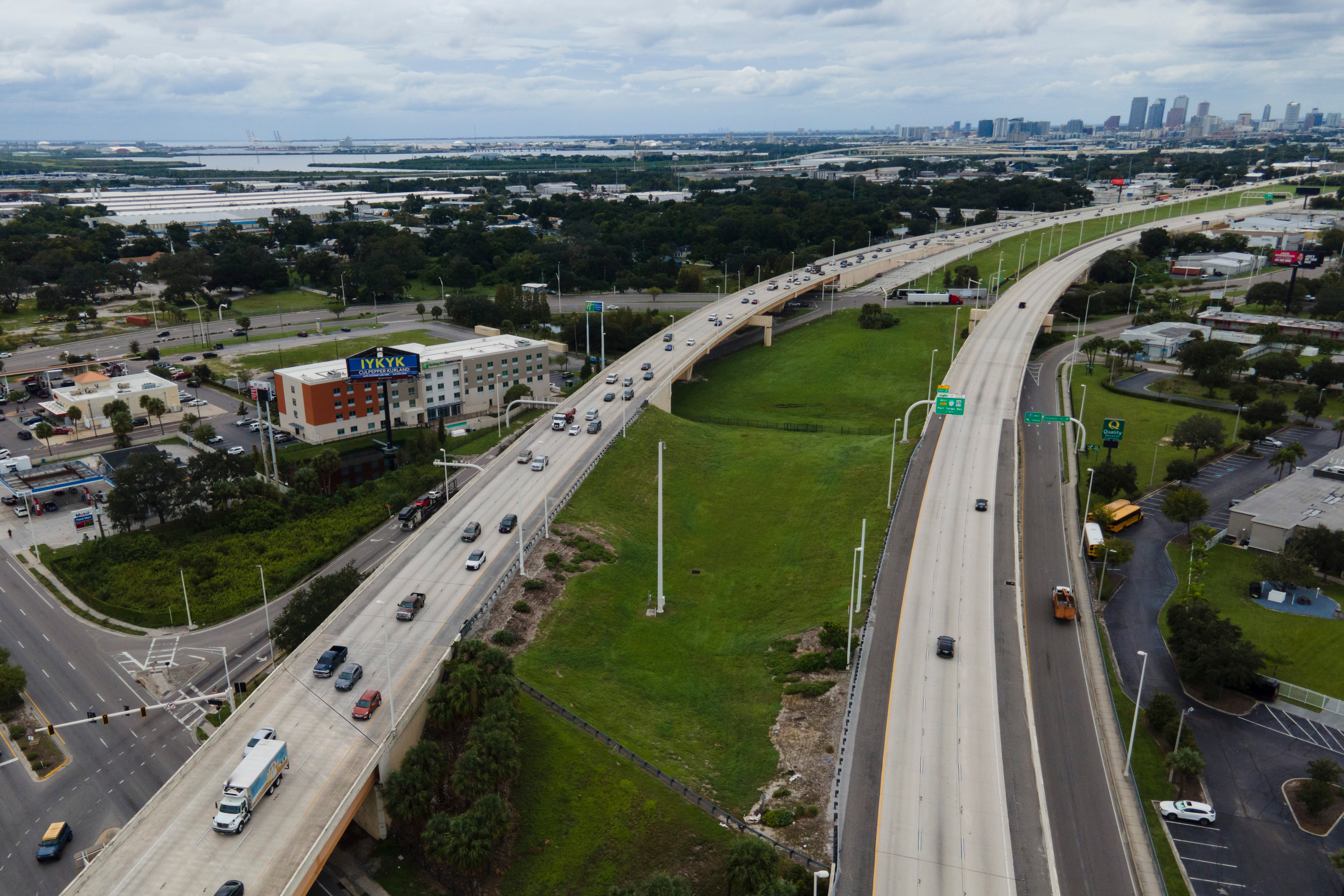 Resident flee from downtown Tampa ahead of Hurricane Milton’s expected arrival, which is set to make landfall on Wednesday