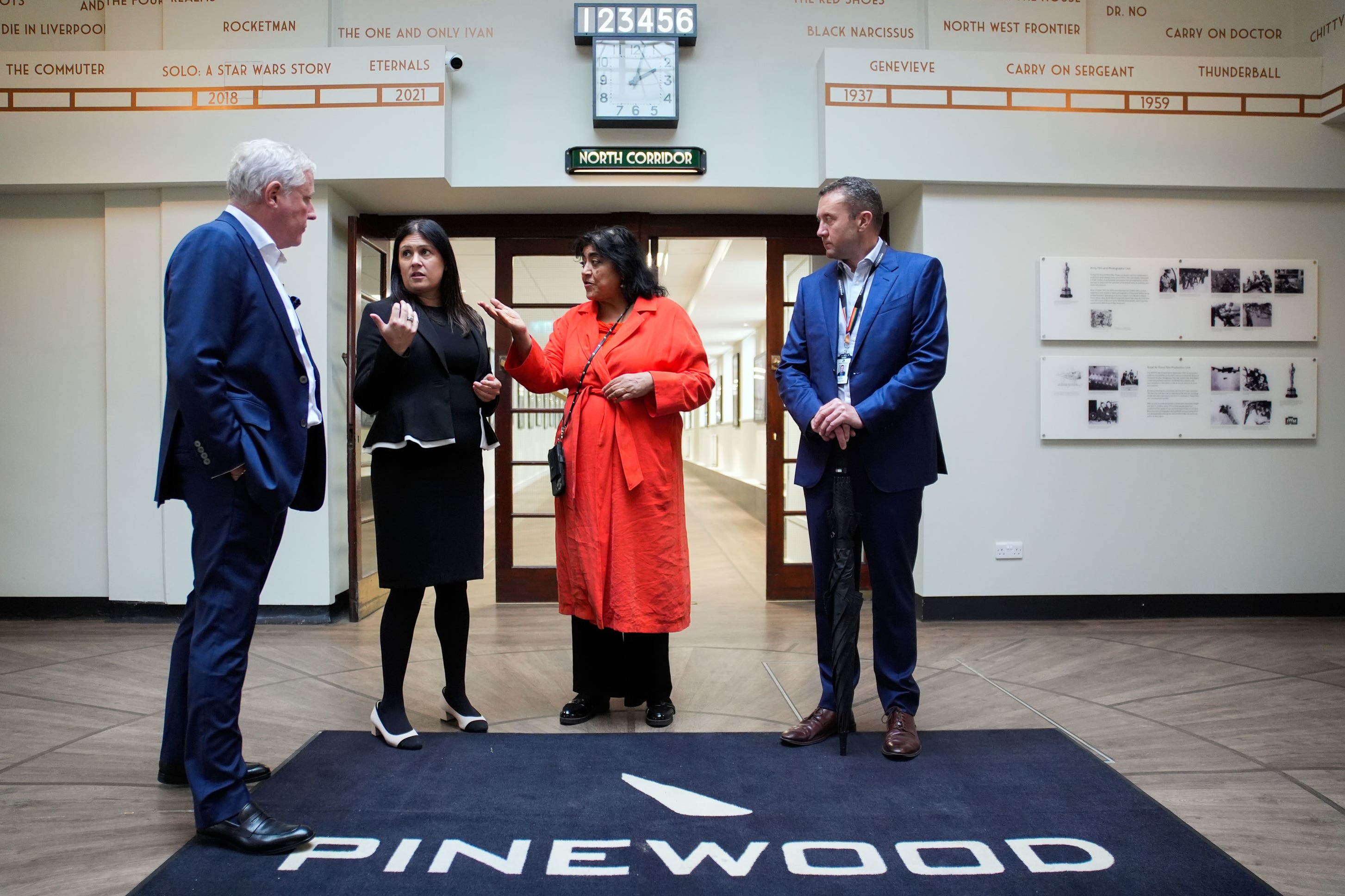 Culture Secretary Lisa Nandy (second left) with by Andrew M Smith, corporate affairs director for Pinewood group (left), filmmaker Gurinder Chadha (second right) and Pinewood group chief executive David Conway (right) during a visit to Pinewood Studios in Iver Heath, Buckinghamshire, to announce new measures to grow the economy and support the UK’s film sector (Andrew Matthews/PA)