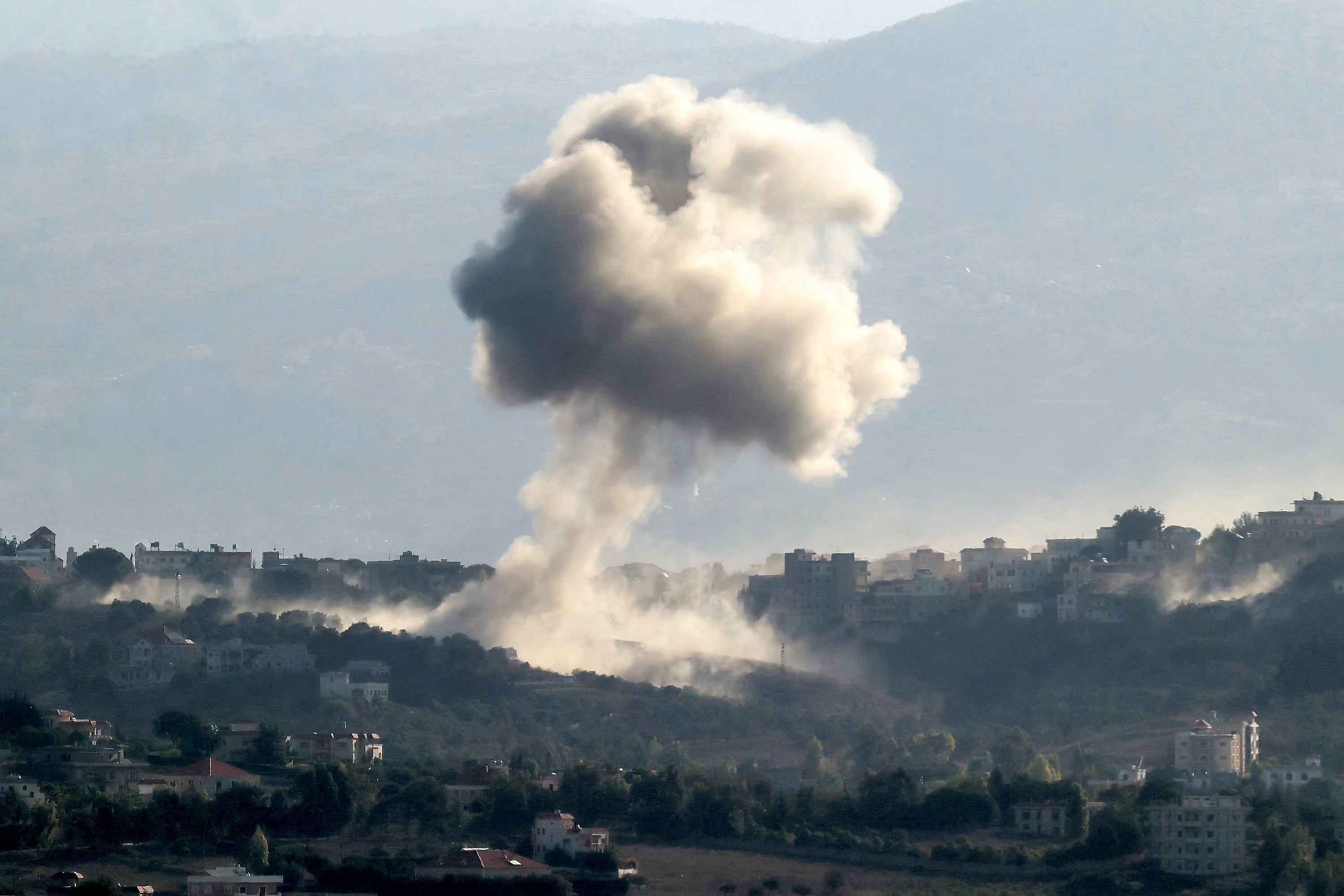 Smoke rises from the site of an Israeli air strike that targeted southern Lebanon