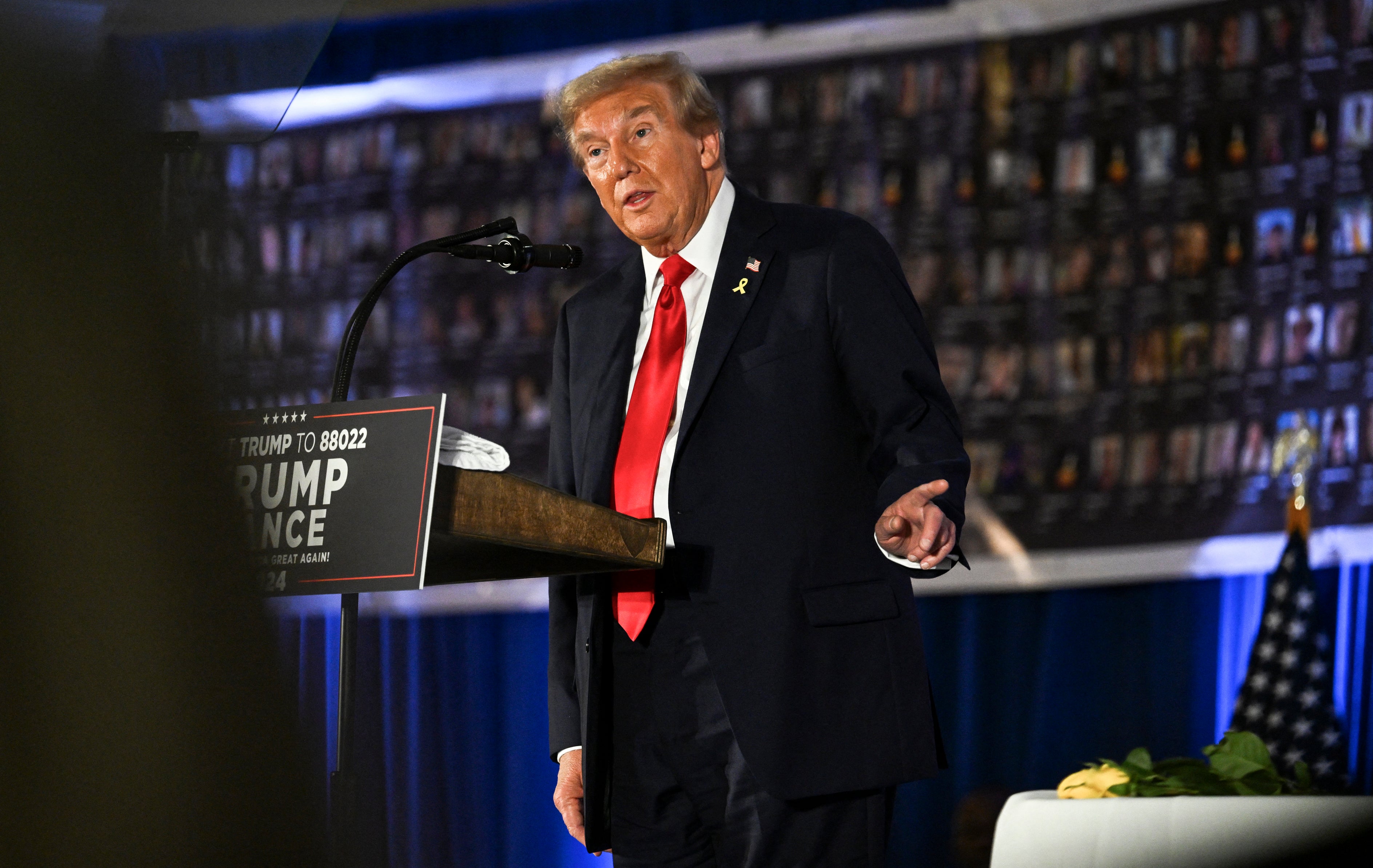 Donald Trump speaks during a remembrance event to mark the first anniversary of the Hamas attack on Israel at Trump National Doral golf club in Miami. He will be holding a rally in Madison Square Garden in Manhattan later this month