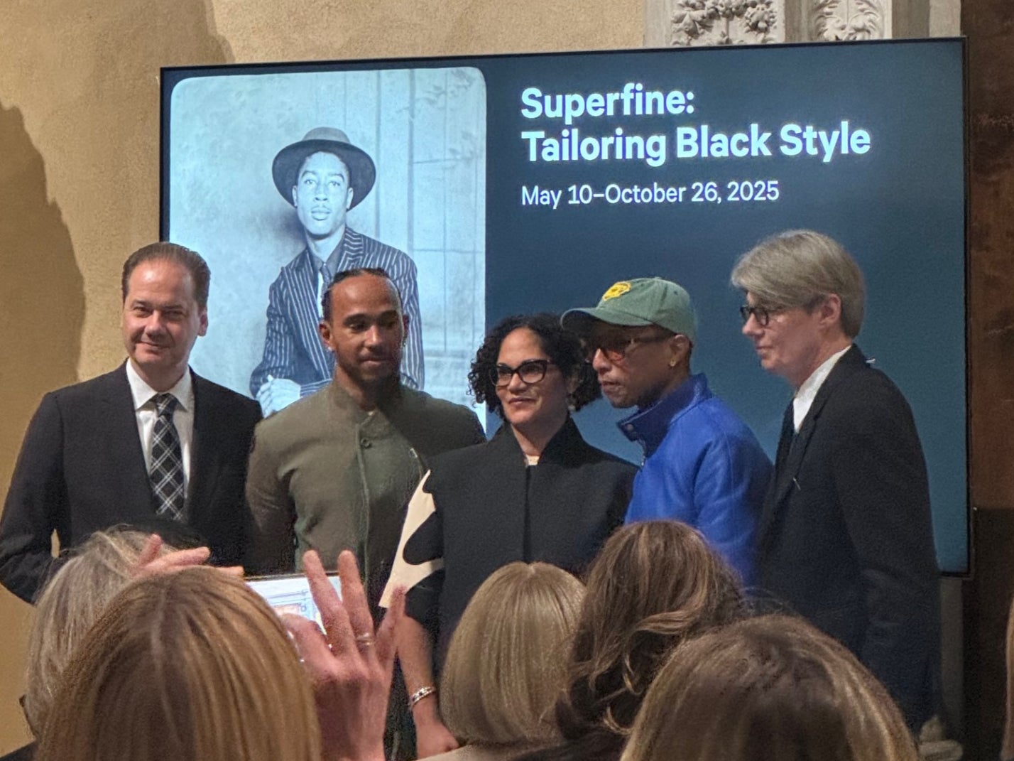 Max Hollein (far left), Lewis Hamilton (left), Monica Miller (middle), Pharrell Williams (right), and Andrew Bolton (far right) at the October 9 Costume Institute press conference