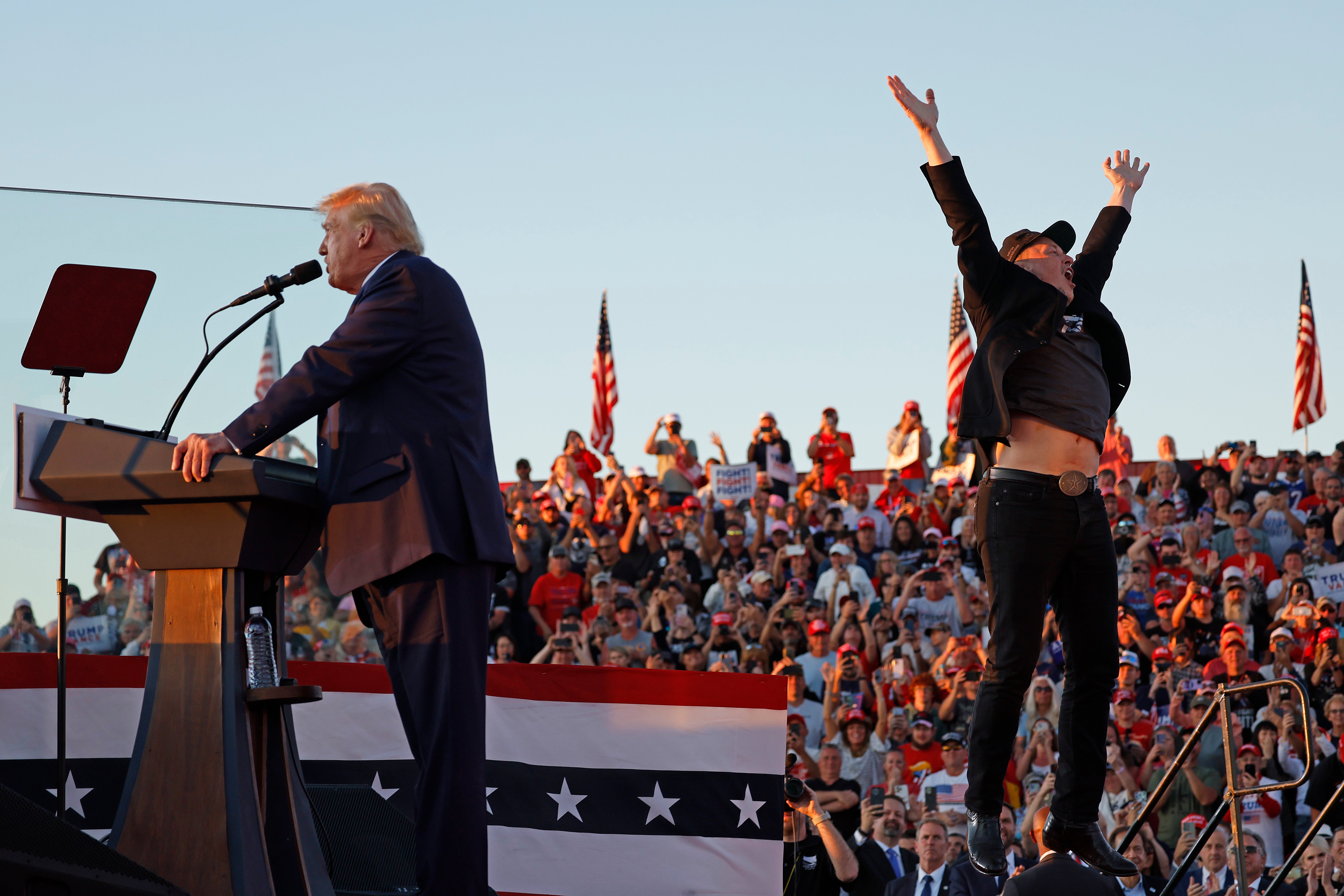 Elon Musk leaps on stage with Republican presidential nominee, former President Donald Trump