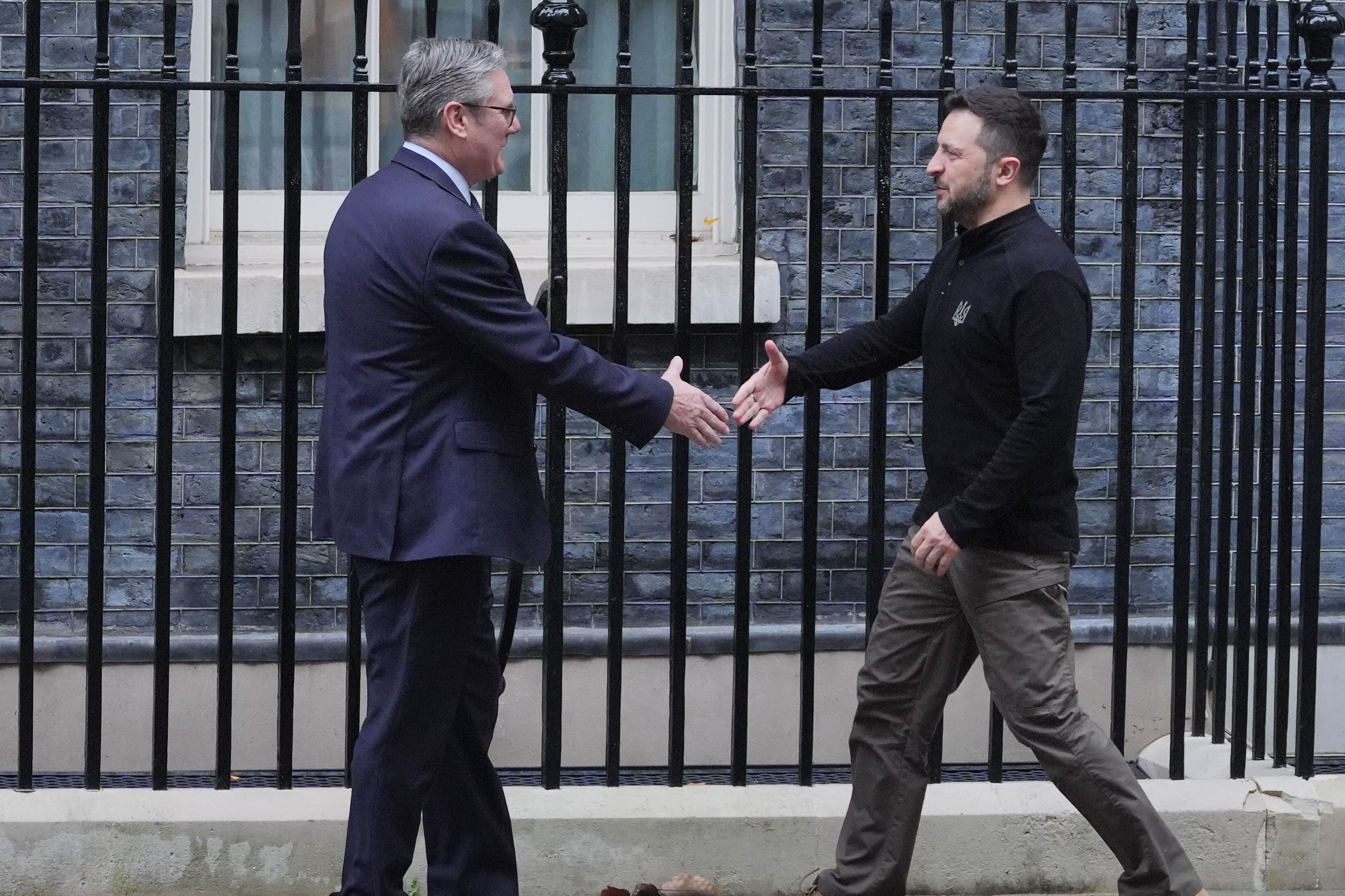 Ukrainian President Volodymyr Zelensky is greeted by Prime Minister Sir Keir Starmer as he arrives in Downing Street (PA)