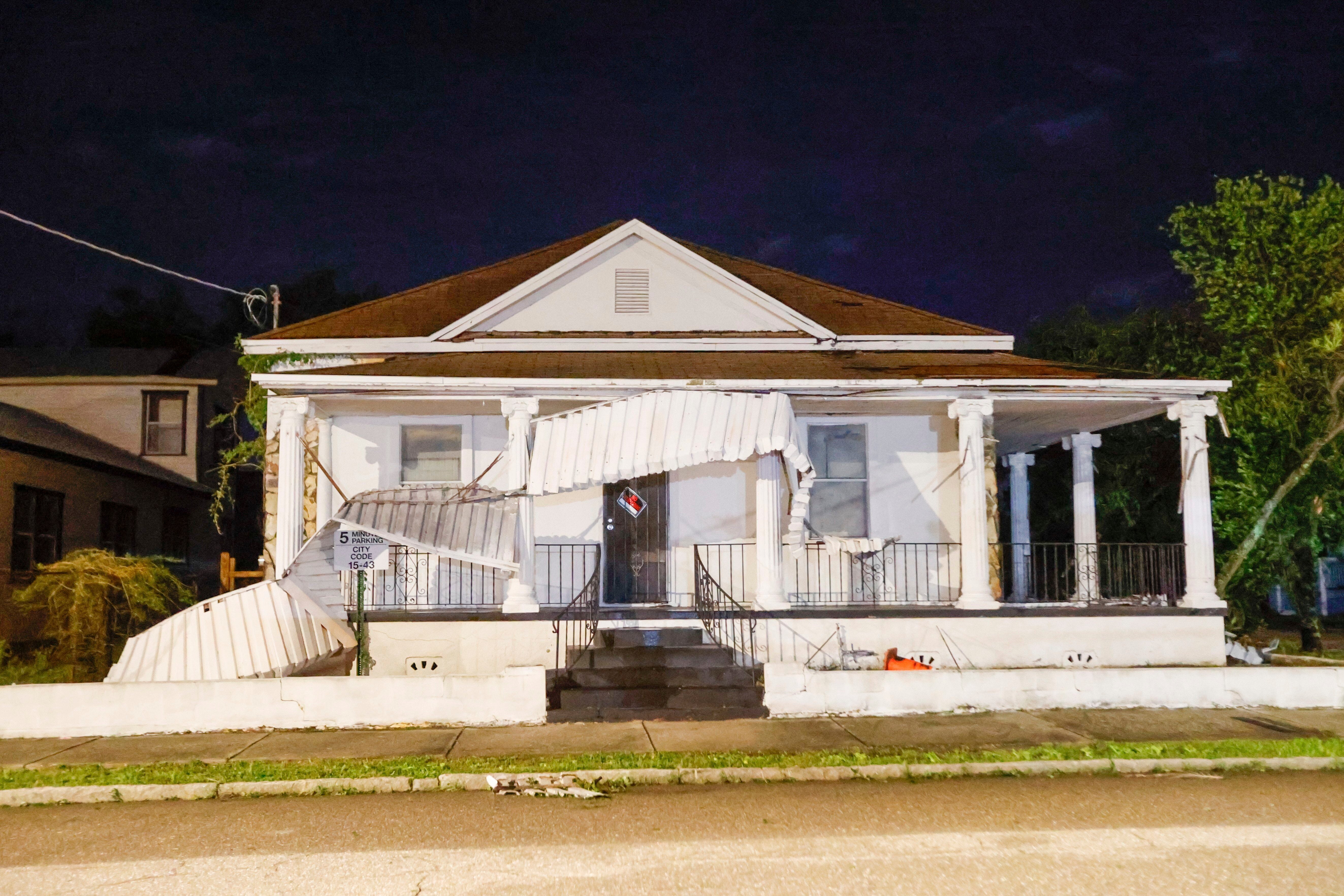 After the hurricane made landfall, several homes sustained damages, including this one that lost its awning in Tampa. However, the storm was not as bad as some predicted. “One of the blessings for us is that we didn’t see that predicted storm surge, so that saved a lot. That was what we were really worried about was the storm surge and so, fortunately it, we didn’t see the peak of it, but it’s not over,” Tampa Bay Mayor Jane Castor said, according to WESH