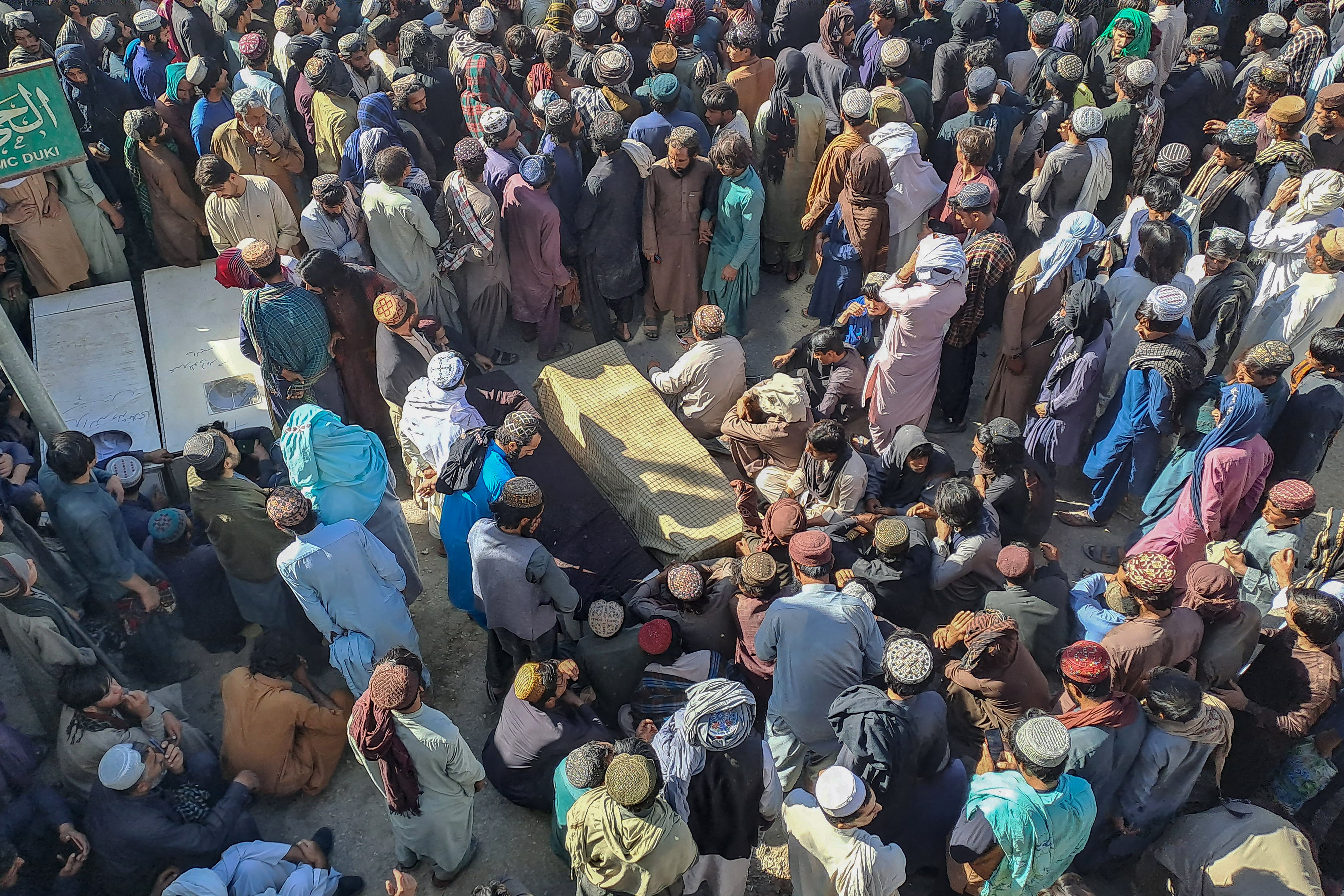 Miners and labourers at a funeral for victims of the terror attack in Duki district of Balochistan province, Pakistan