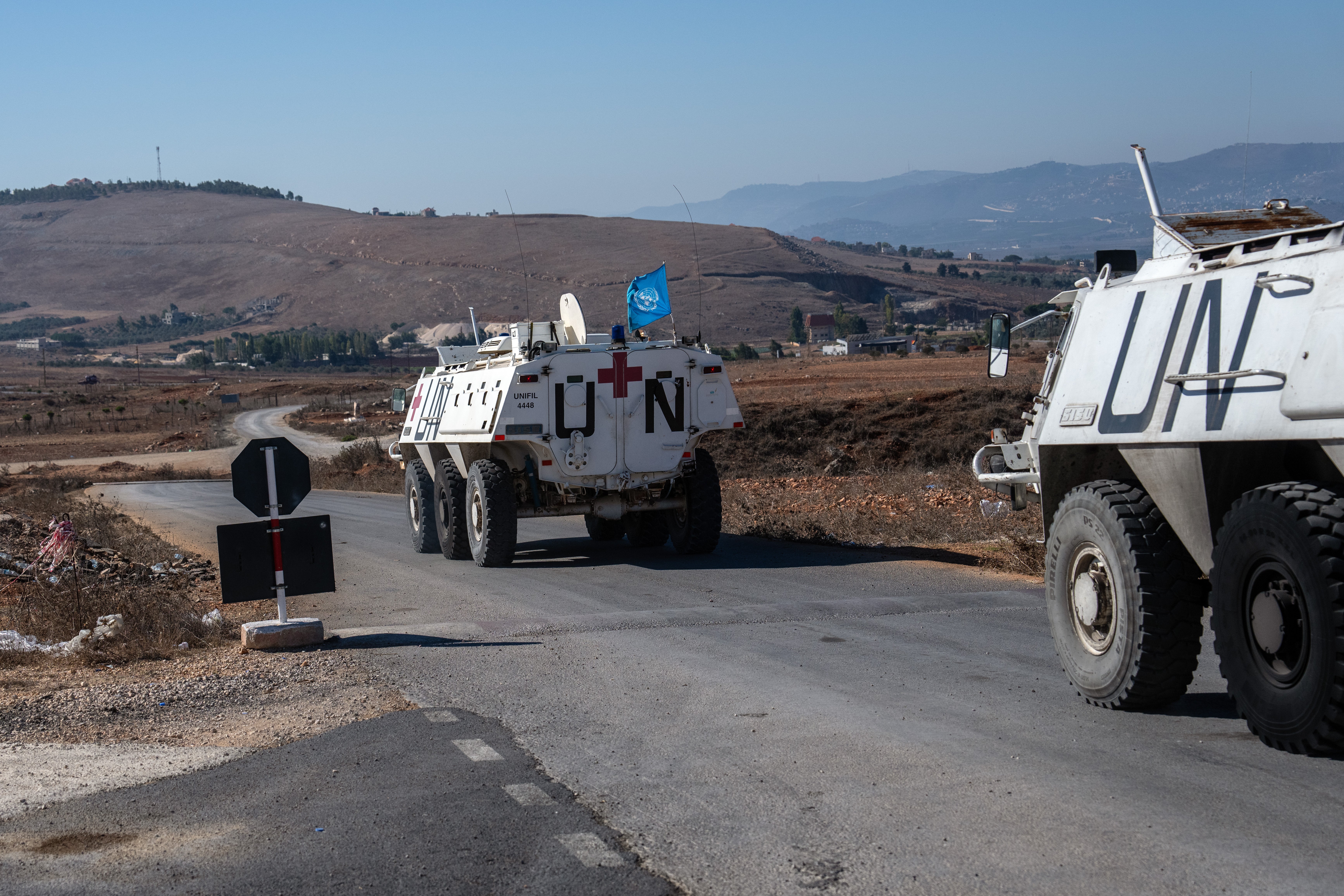 Unifil armoured personnel carriers leave a base to patrol near the Lebanon-Israel border on 5 October in Marjayoun