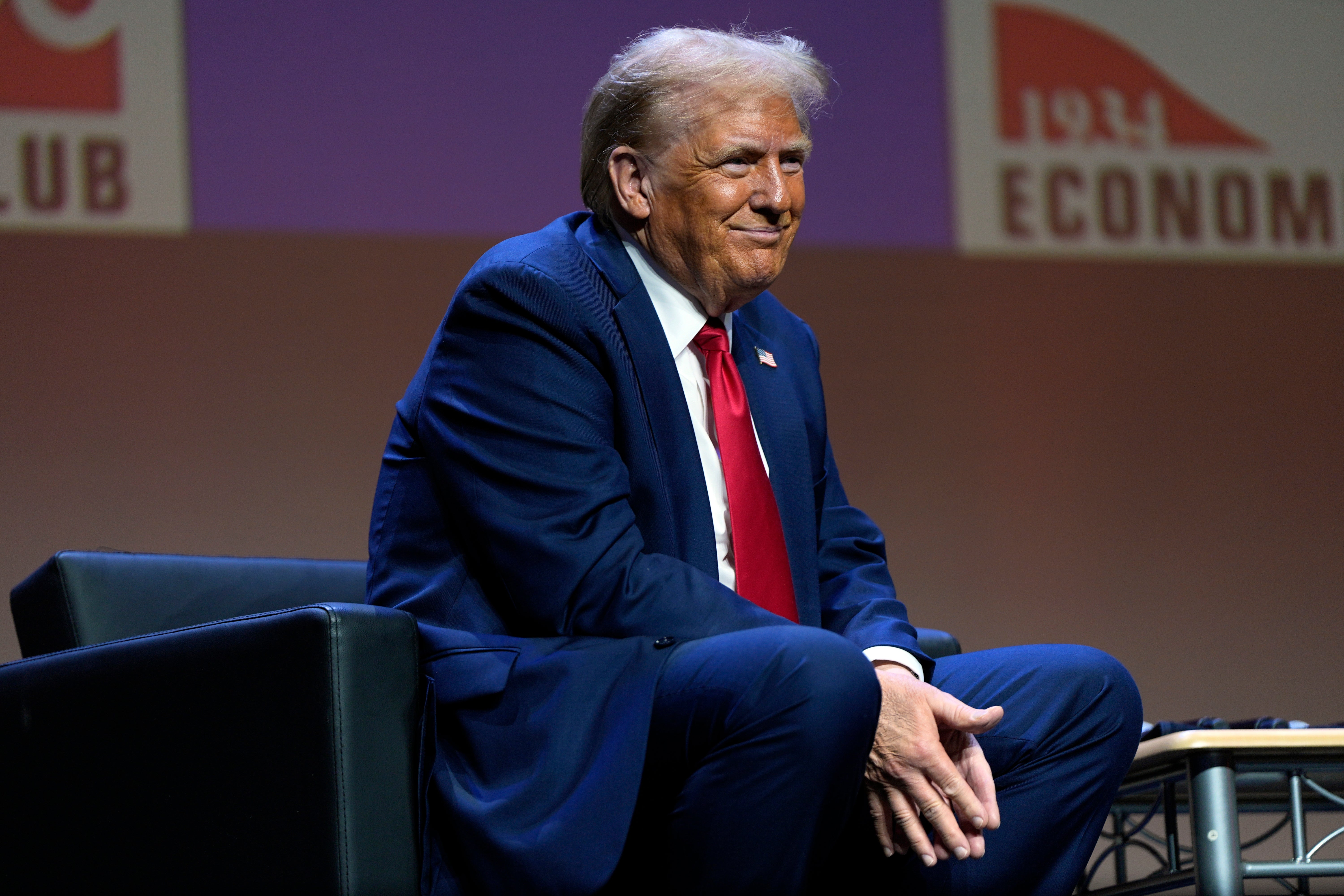 Republican presidential nominee former President Donald Trump listens as he answers questions at a meeting of the Detroit Economic Club on Thursday. Trump’s own health has drawn more attention given his advanced age and behaviors on the campaign trail