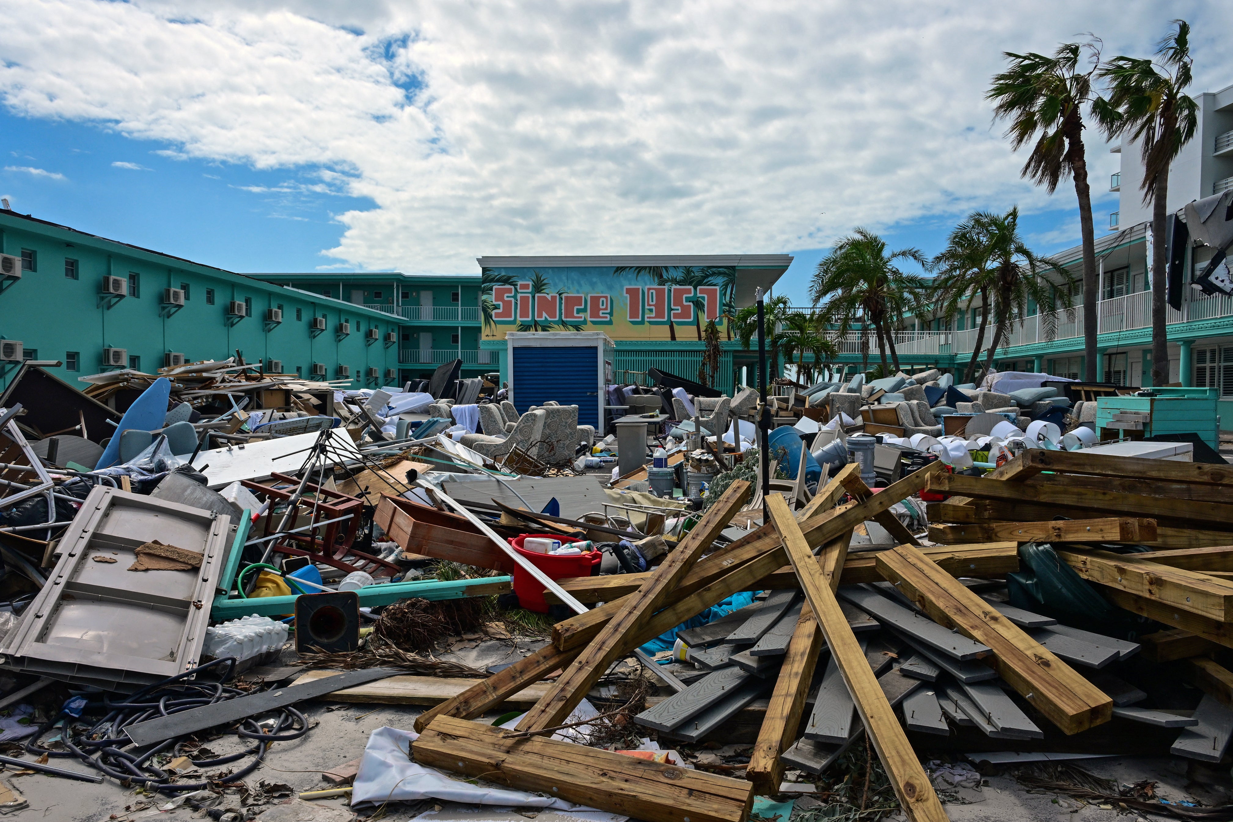 Debris is seen in front of the Thunderbird Beach Resort in the aftermath of Hurricane Milton in Treasure Island, Florida, on October 11, 2024