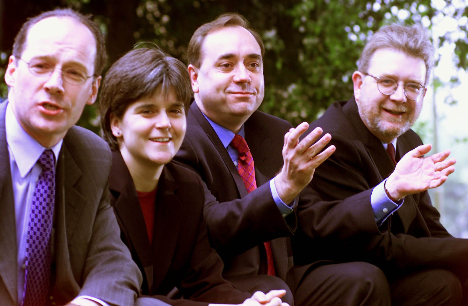 (Left to right) The then SNP deputy convenor John Swinney, vice convenor Nicola Sturgeon, leader Alex Salmond and chief executive Mike Russell a day after Scottish parliamentary elections