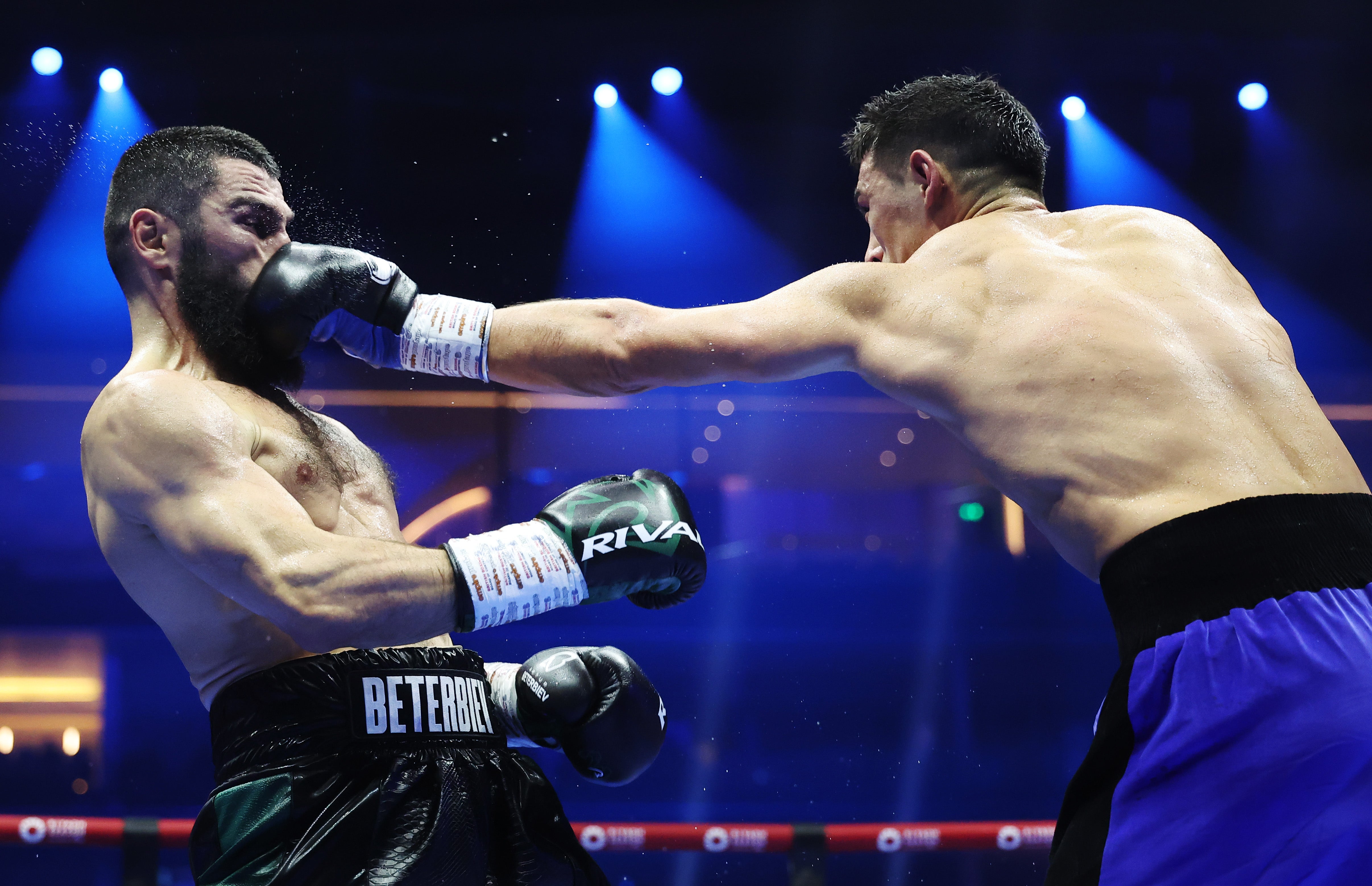 Dmitry Bivol (right) during his closely-fought bout with Artur Beterbiev