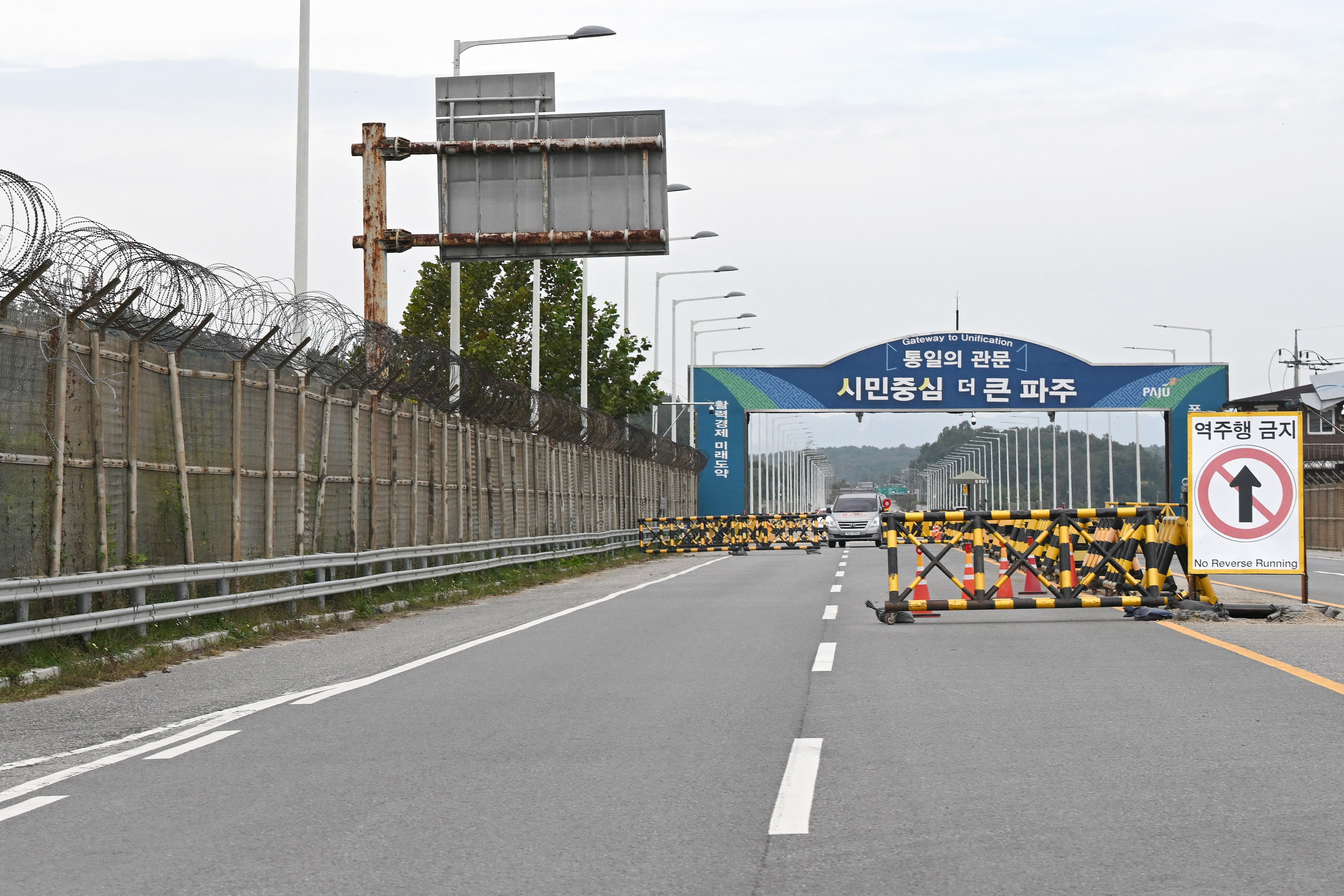 Barricades are seen at a military checkpoint on the Tongil bridge, the road leading to North Korea’s Kaesong city, in the border city of Paju on 14 October