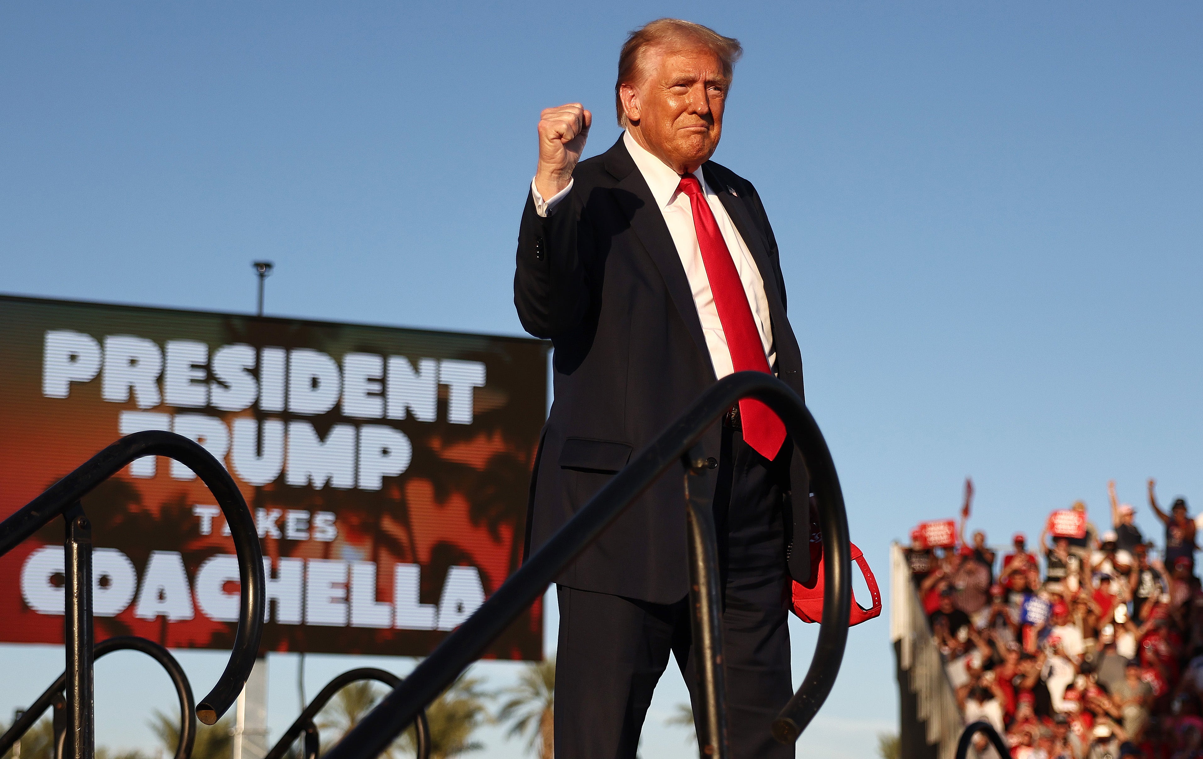 Donald Trump has regained the lead over Kamala Harris in the betting markets less than a month before election day. He is seen here at a rally in California over the weekend