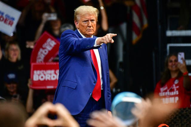 <p>Trump gestures at the crowd during a campaign rally at Findlay Toyota Arena in Prescott Valley, Arizona, on Sunday </p>