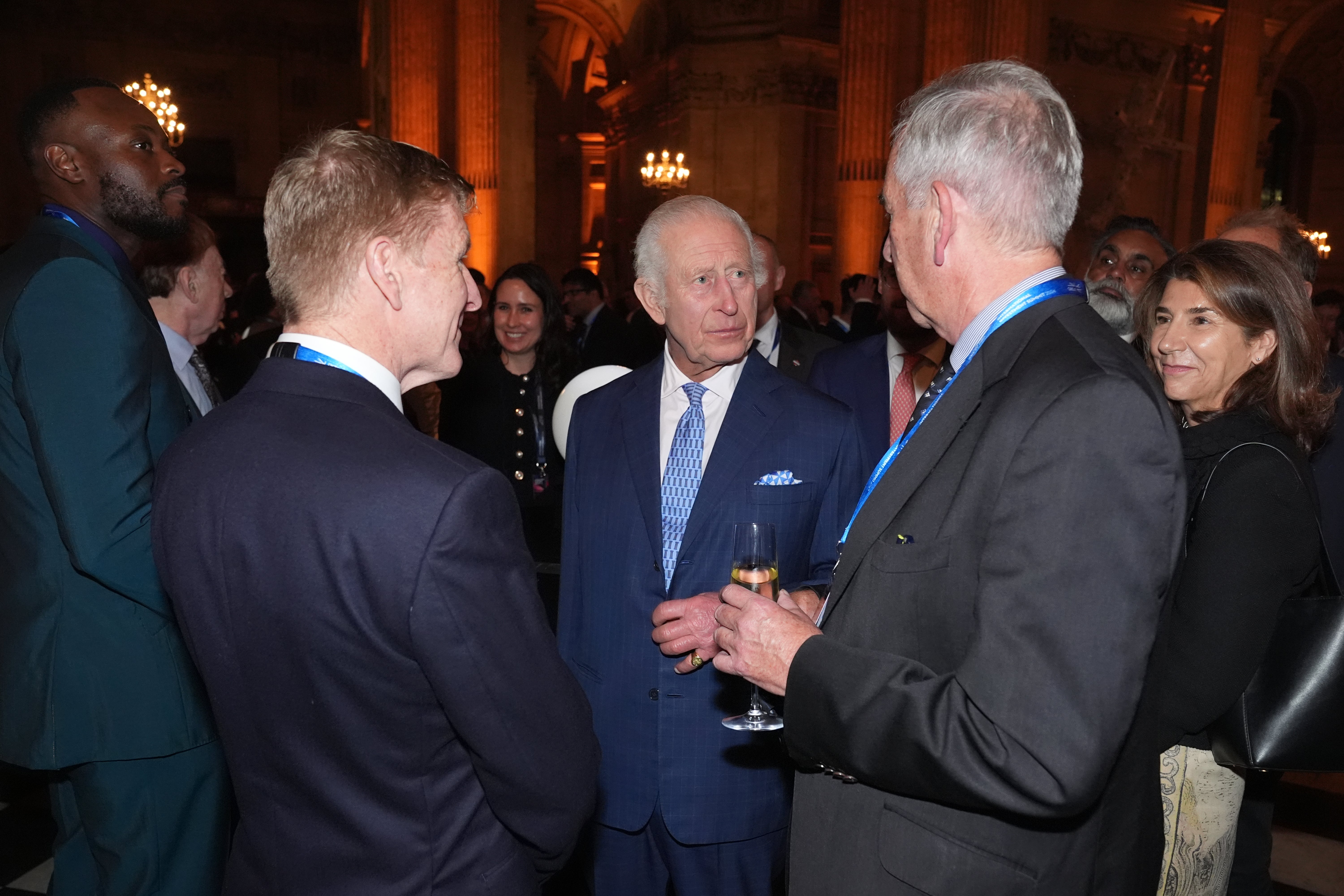 The King shook hands and spoke to a wide group of notable figureheads