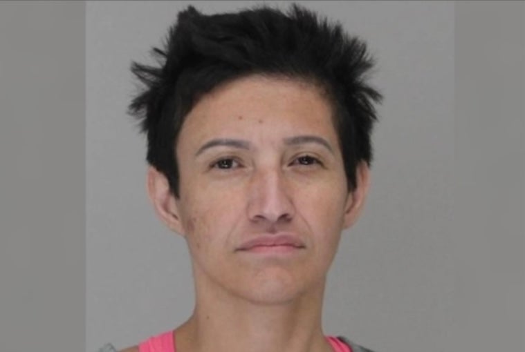 Mirsa Lopez is accused of starting a fire at a Dallas mobile area that led to the death of one man and three dogs