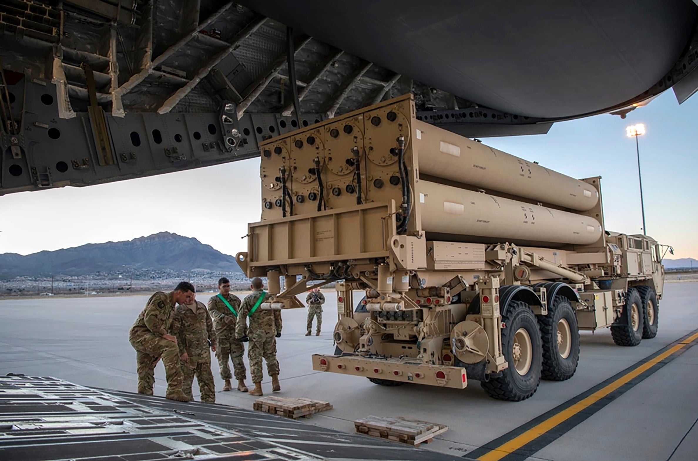 US Army Terminal High Altitude Area Defense (THAAD) launching station preparing to load onto a 4th Airlift Squadron C-17 Globemaster III at Fort Blis