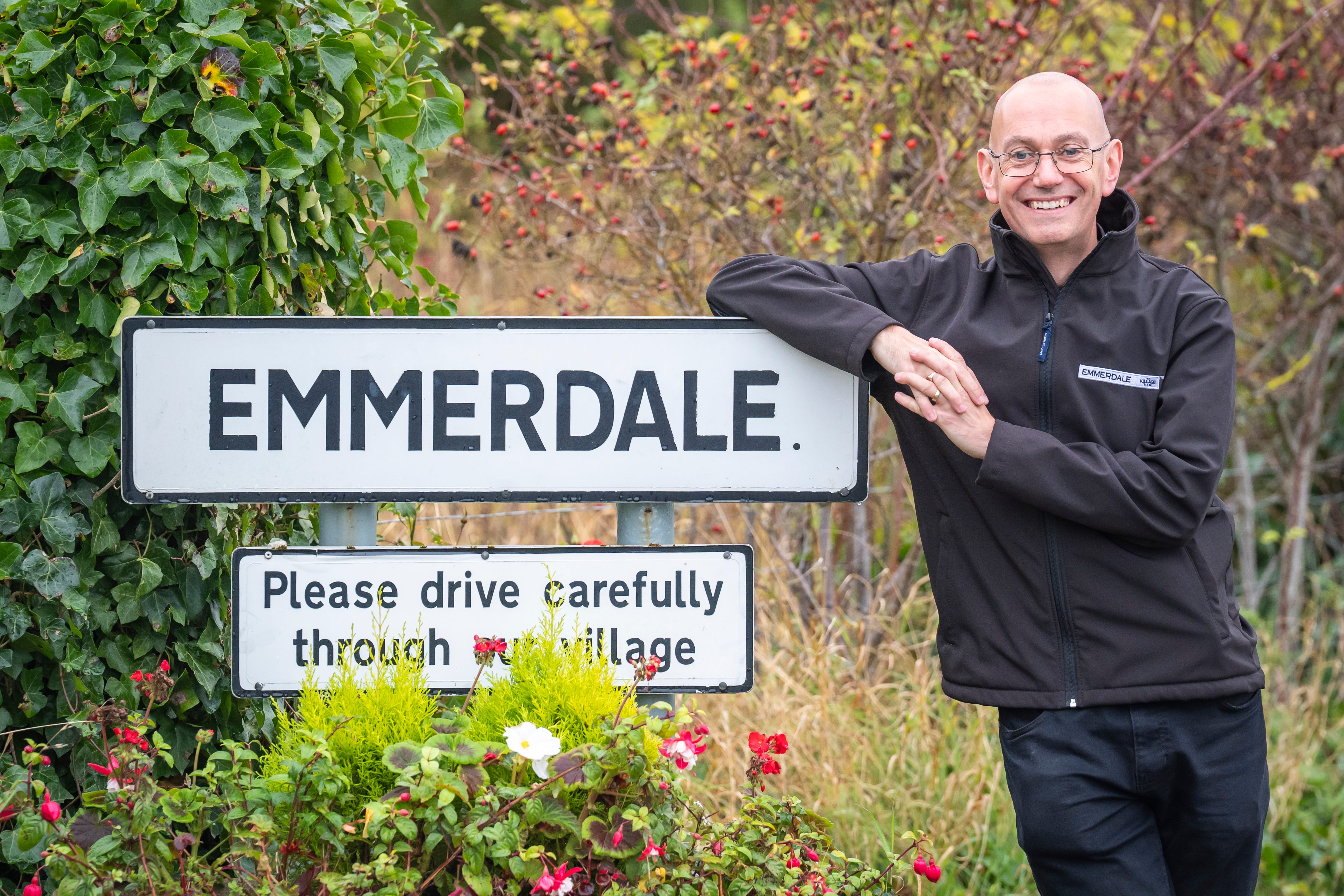 Steve Marshall next to the Emmerdale sign