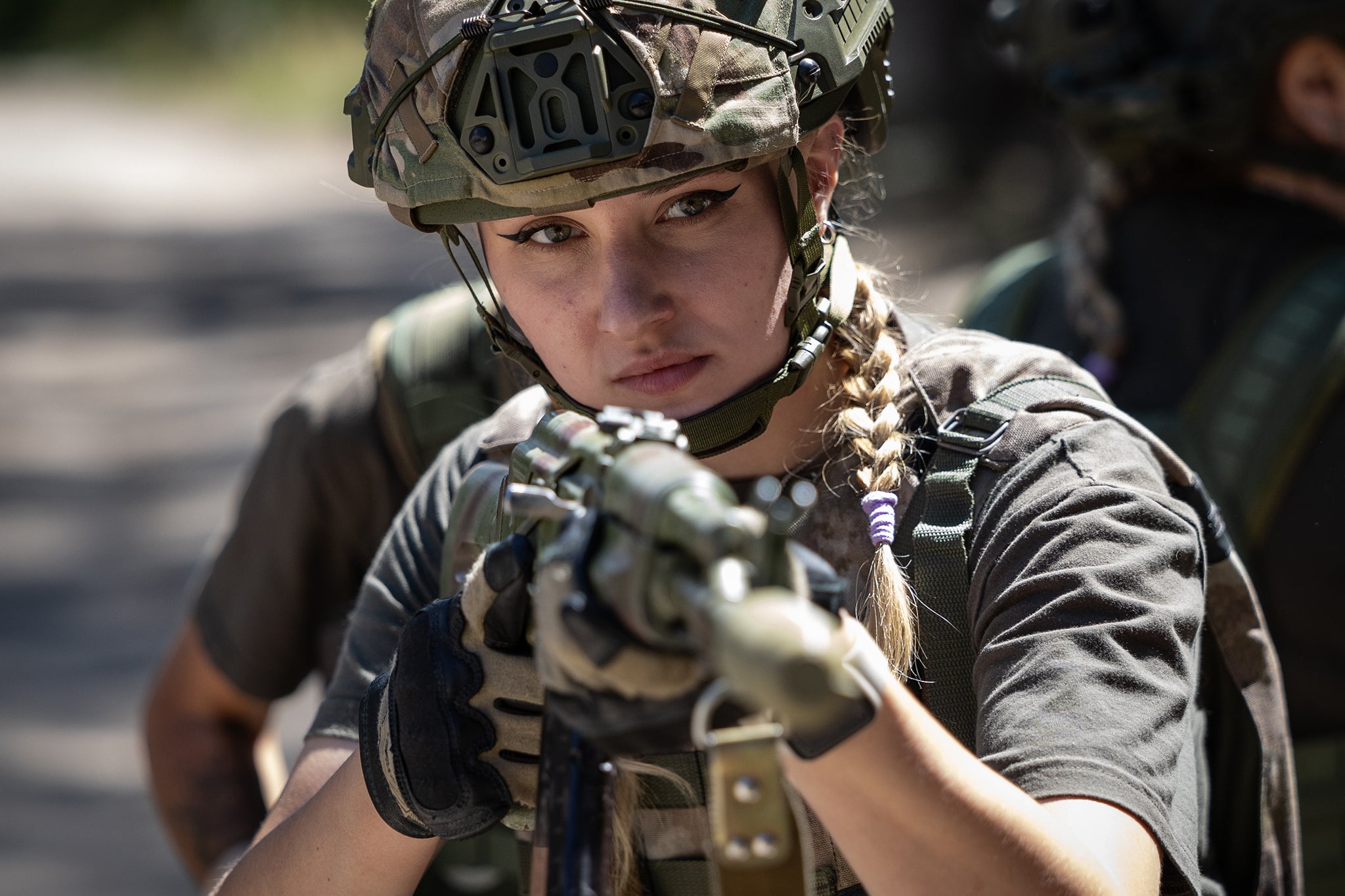 The women are volunteers in air defence units and have undergone training to wield machine guns and assault rifles