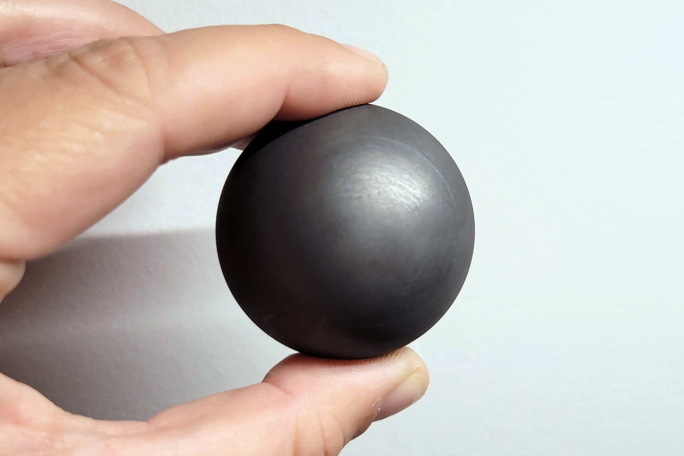 A golf-ball-sized fuel pebble from Kairos Power, a nuclear energy startup based in California that secured a deal with Google in October 2024