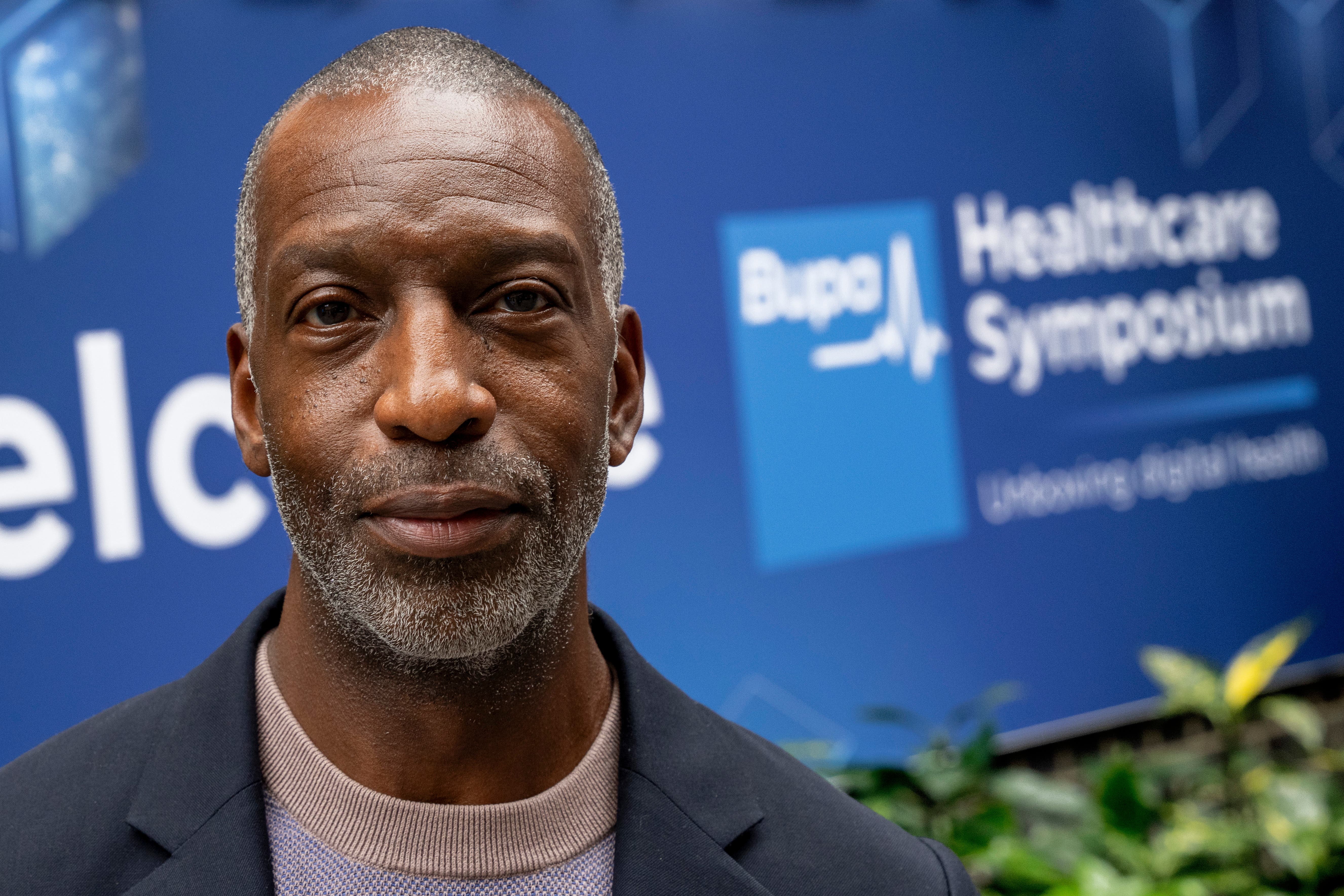 Michael Johnson at a Bupa Healthcare Symposium (Jeff Moore/Bupa)