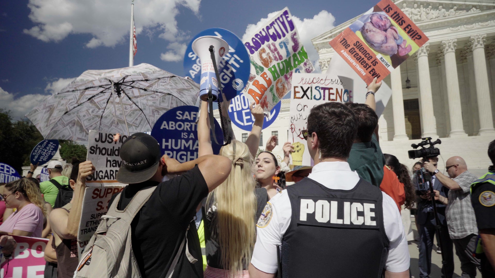 Protesters clash outside the Supreme Court after the court’s conservative majority struck down Roe v Wade on 24 June 2022