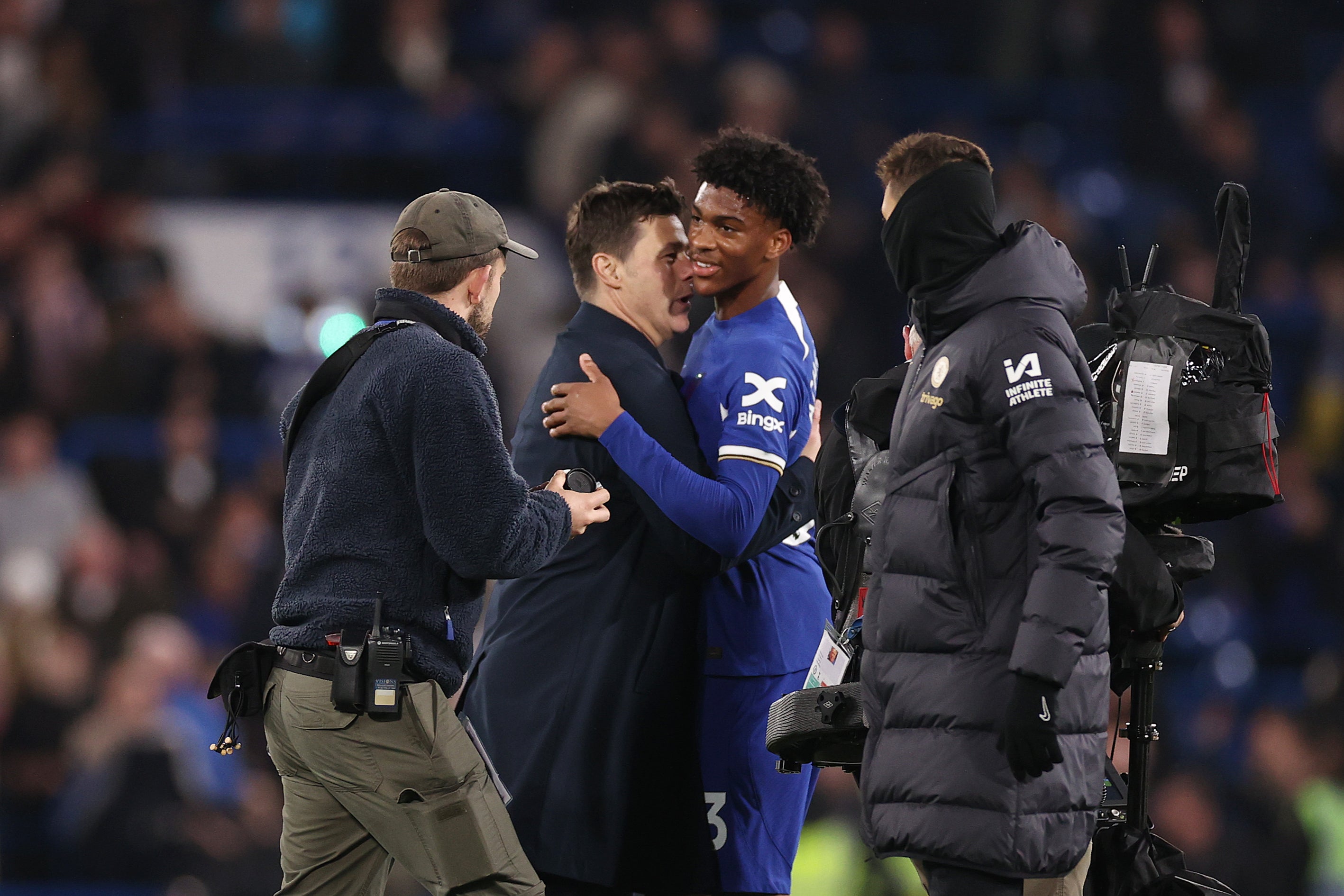 Mauricio Pochettino embraces Joshua Acheampong after his debut against Spurs