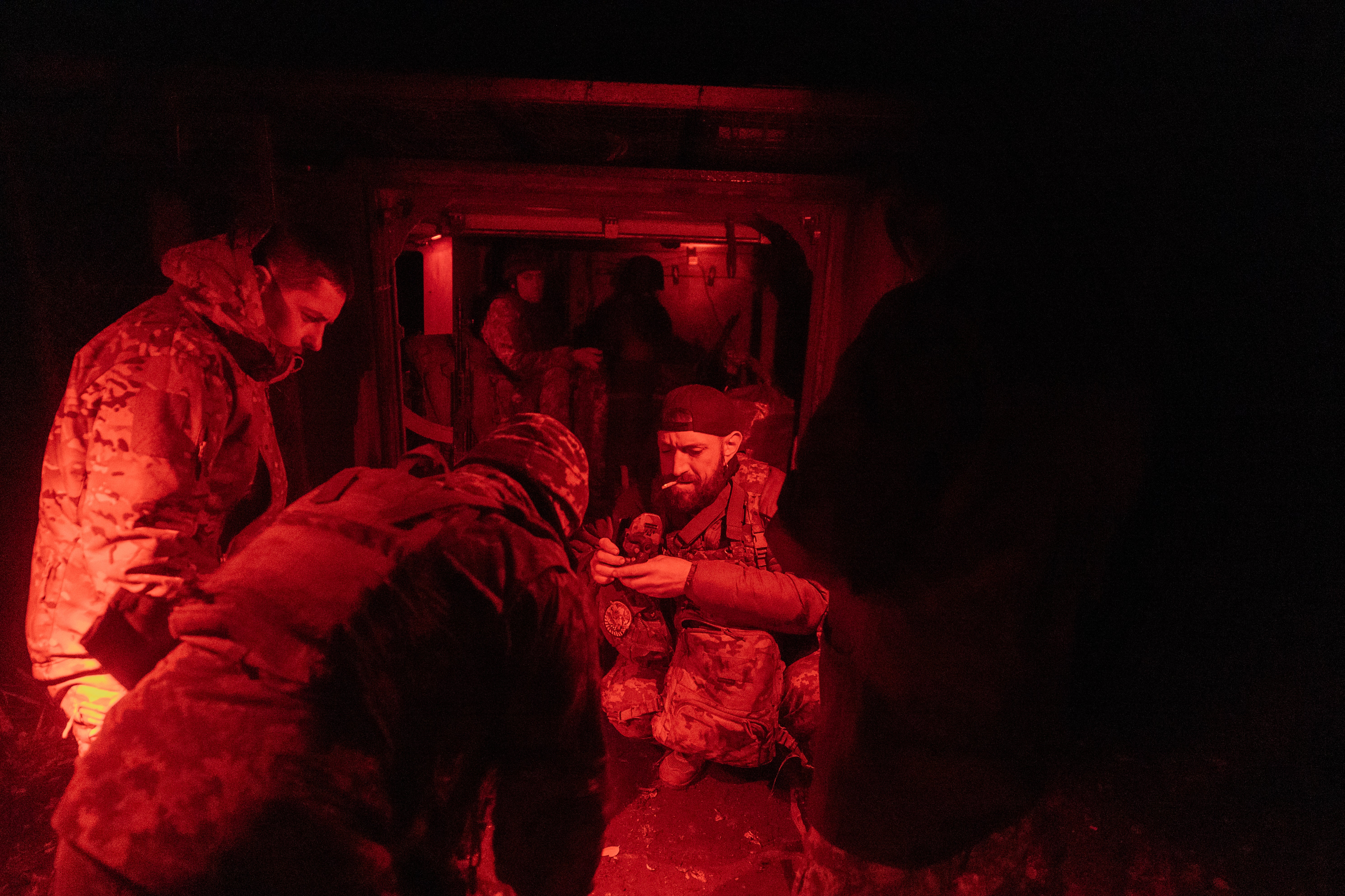 Ukrainian servicemen of the 33rd Mechanised Brigade prepare to leave for fighting on the frontline in Donetsk