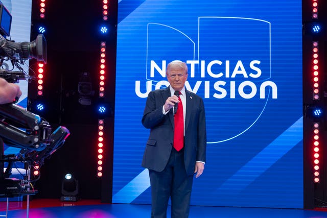 <p>Donald Trump speaks at a Univision town hall event, during which one voter asked him if he really believes his own lies about Haitian immigrants in Springfield, Ohio </p>