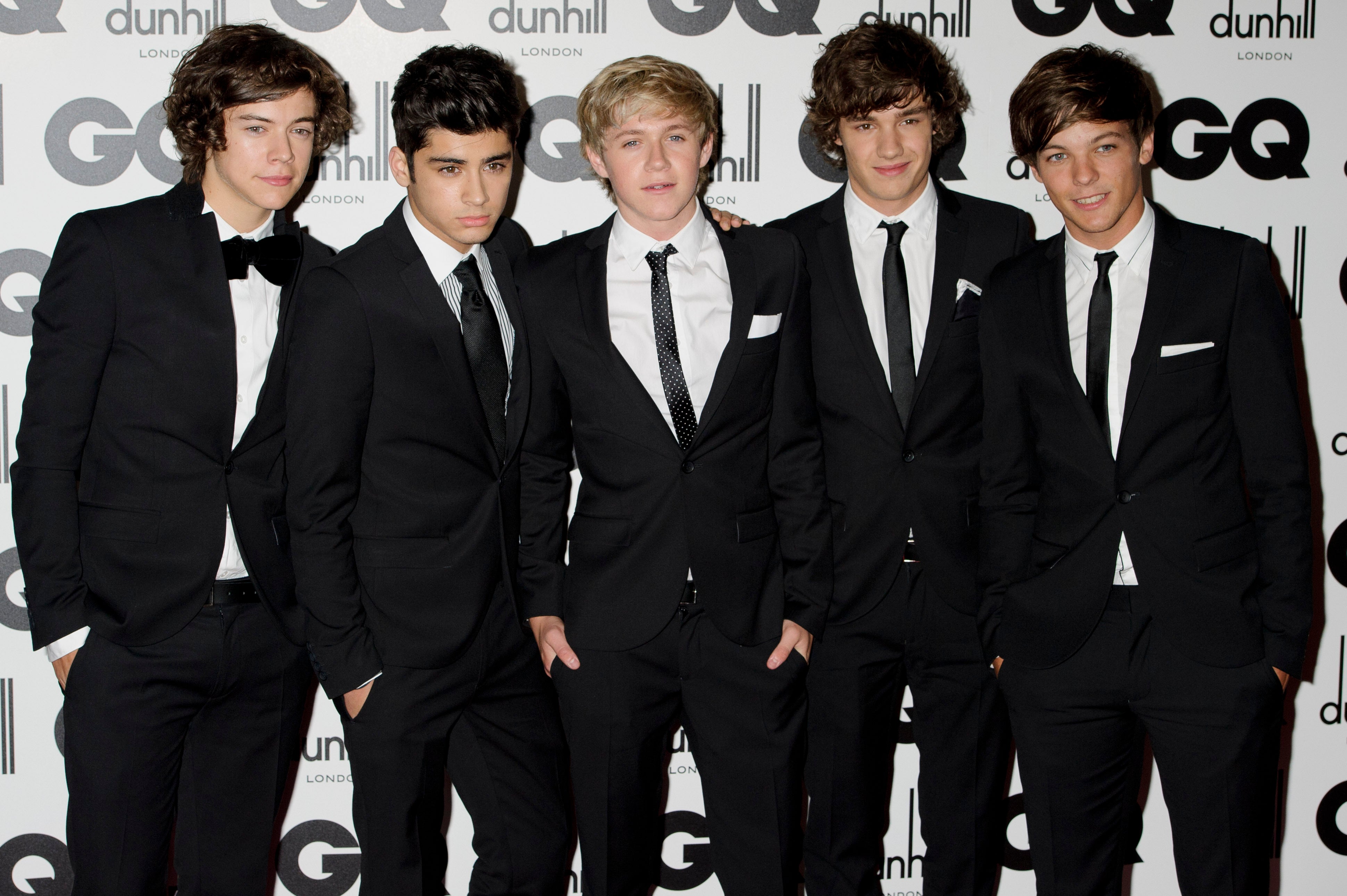 One Direction member Liam Payne, second from right, poses with fellow band members Harry Styles, Zayn Malik, Niall Horan and Liam Tomlinson at the GQ Men of the Year Awards in London in 2011