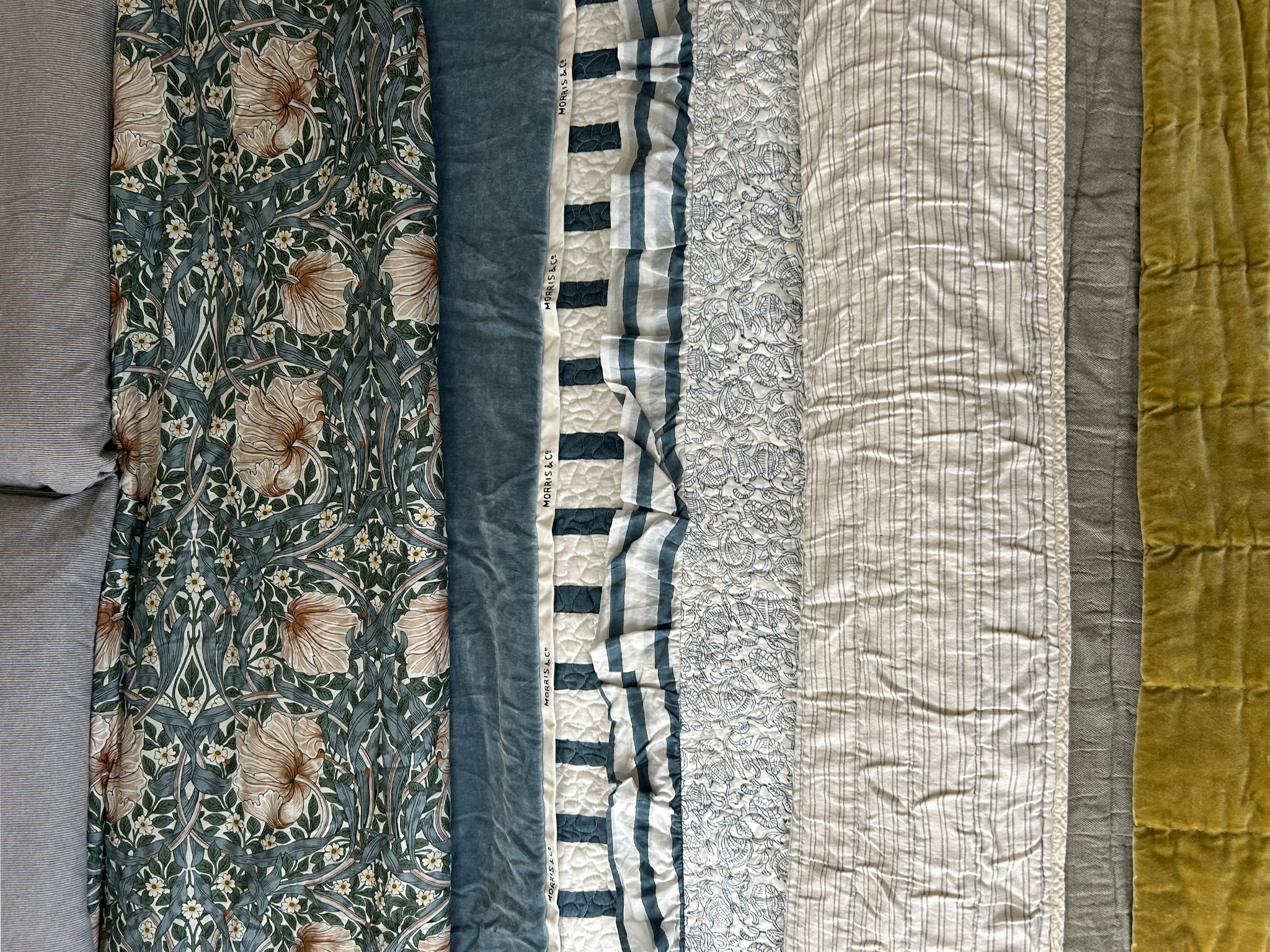 We tried linen, cotton and velvet bedspreads over our king-sized bed