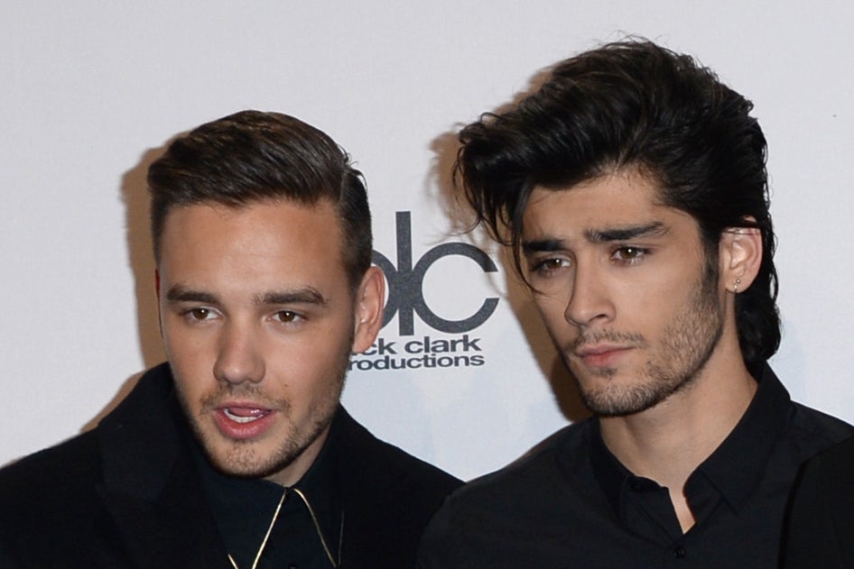 Liam Payne and Zayn Malik attending the American Music Awards in 2014