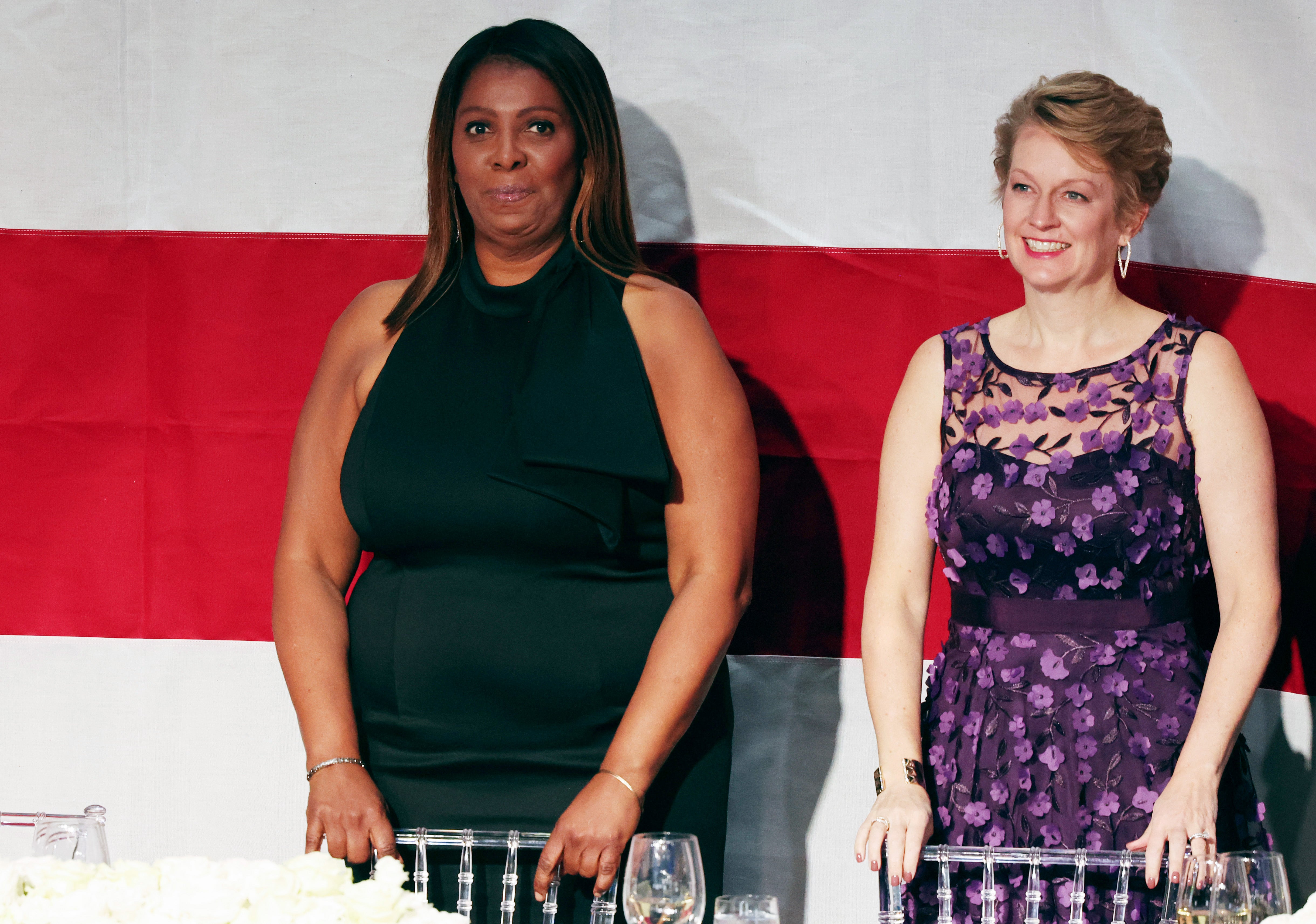 Attorney General of New York Letitia James (L) stands during the annual Alfred E. Smith Foundation Dinner. James has civilly prosecuted Trump and has been an outspoken critic.